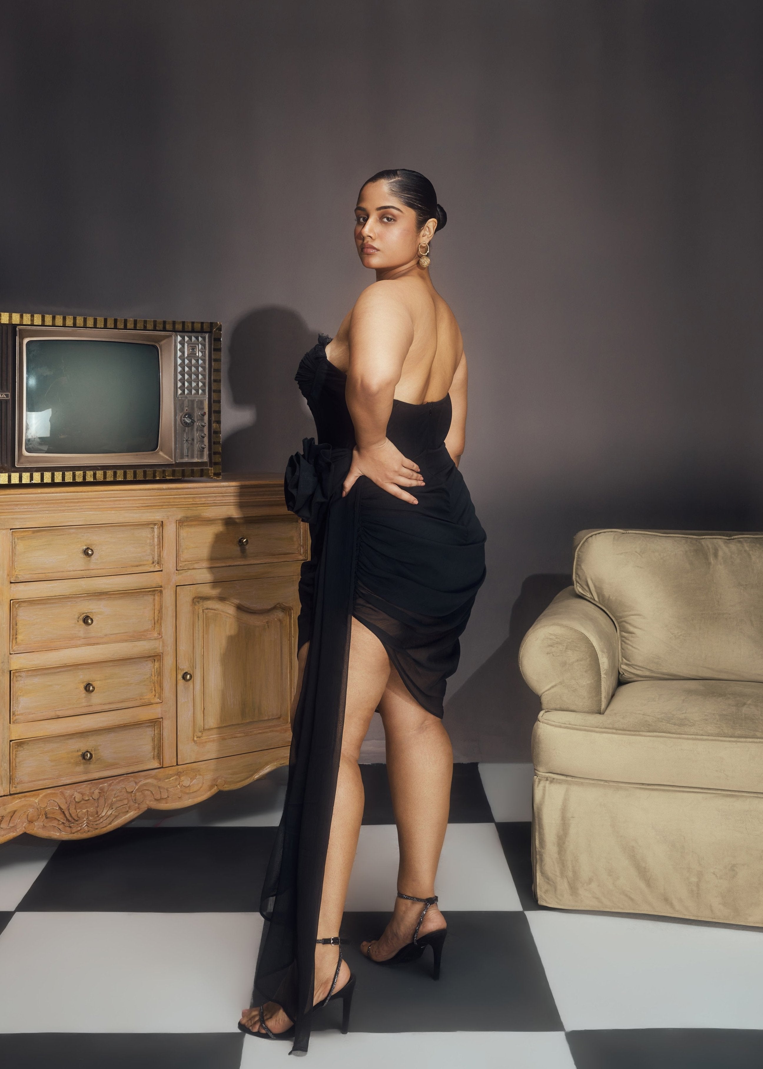 Abba Black Chiffon Strapless Rose Embellished Asymmetrical Midi Bustier Dress, featuring delicate rose details and a stylish asymmetrical hemline.