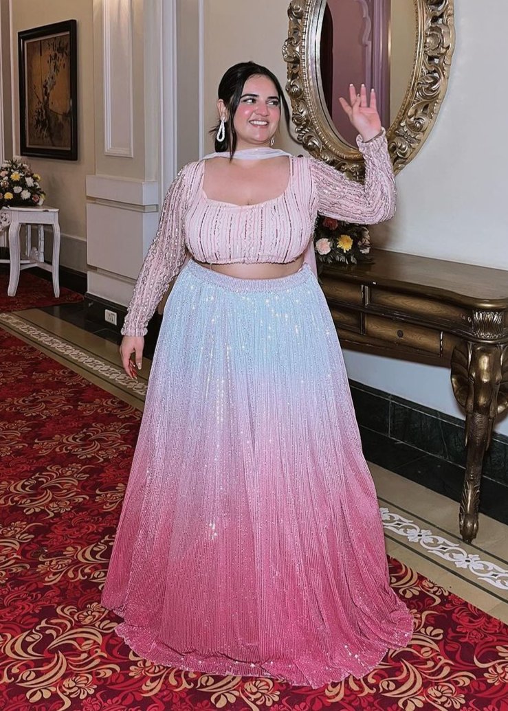 Anaisha Pink Ombre Embroidered Lehenga Set with a gradient pink color and intricate embroidery.