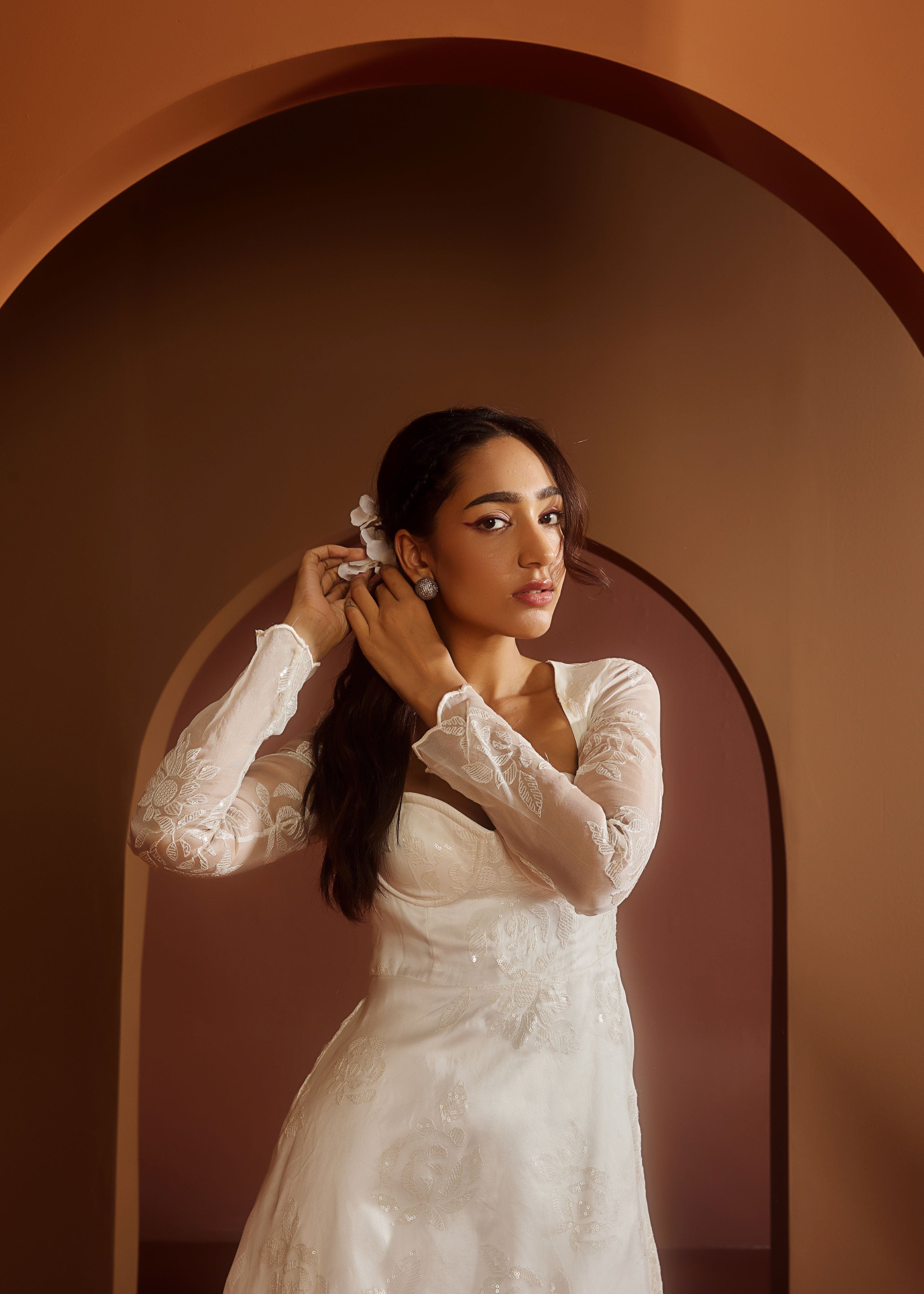 Avya White Embroidered Corset Anarkali Suit featuring intricate embroidery and a fitted corset design for a blend of traditional elegance and modern style