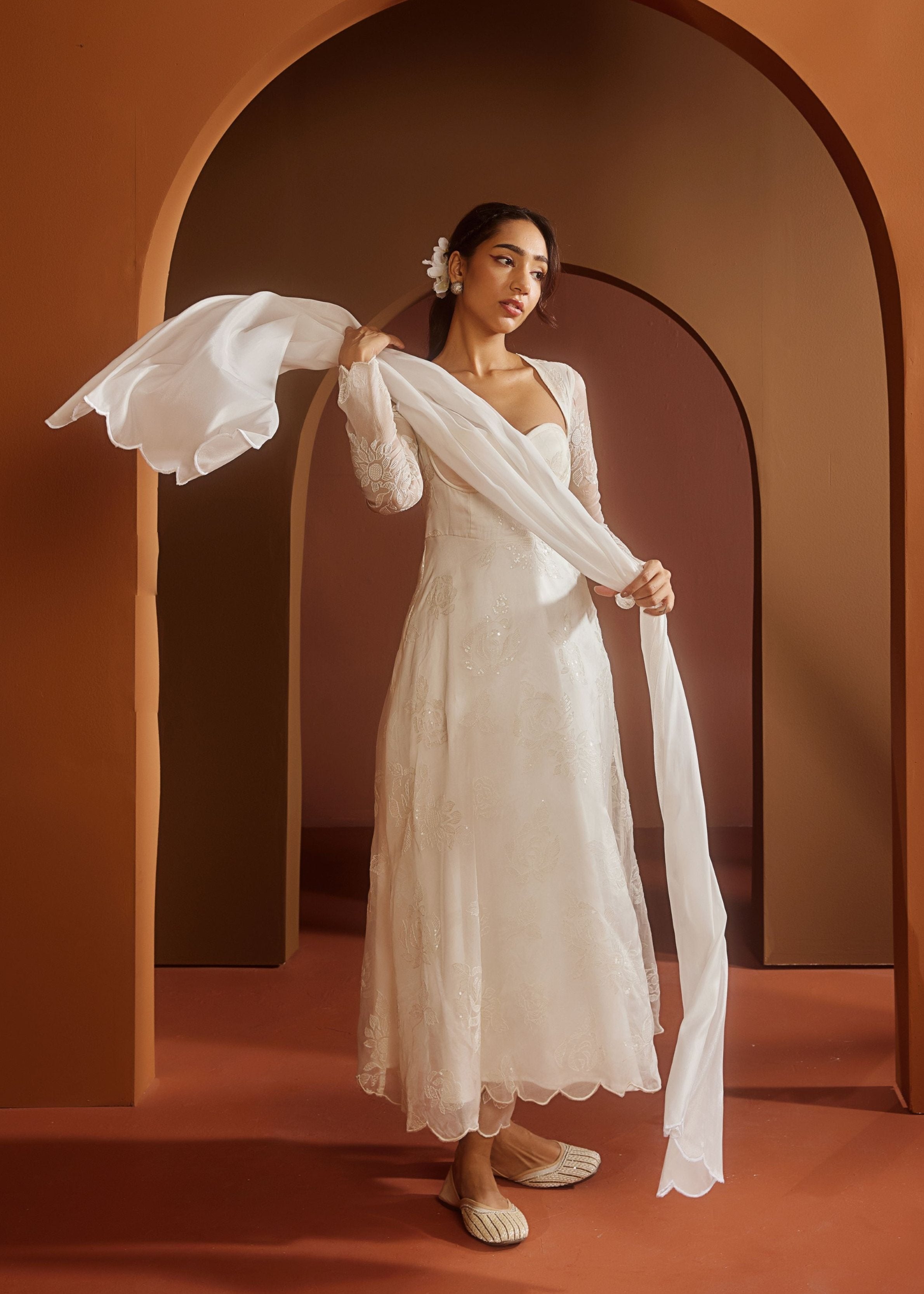 Avya White Embroidered Corset Anarkali Suit featuring intricate embroidery and a fitted corset design for a blend of traditional elegance and modern style