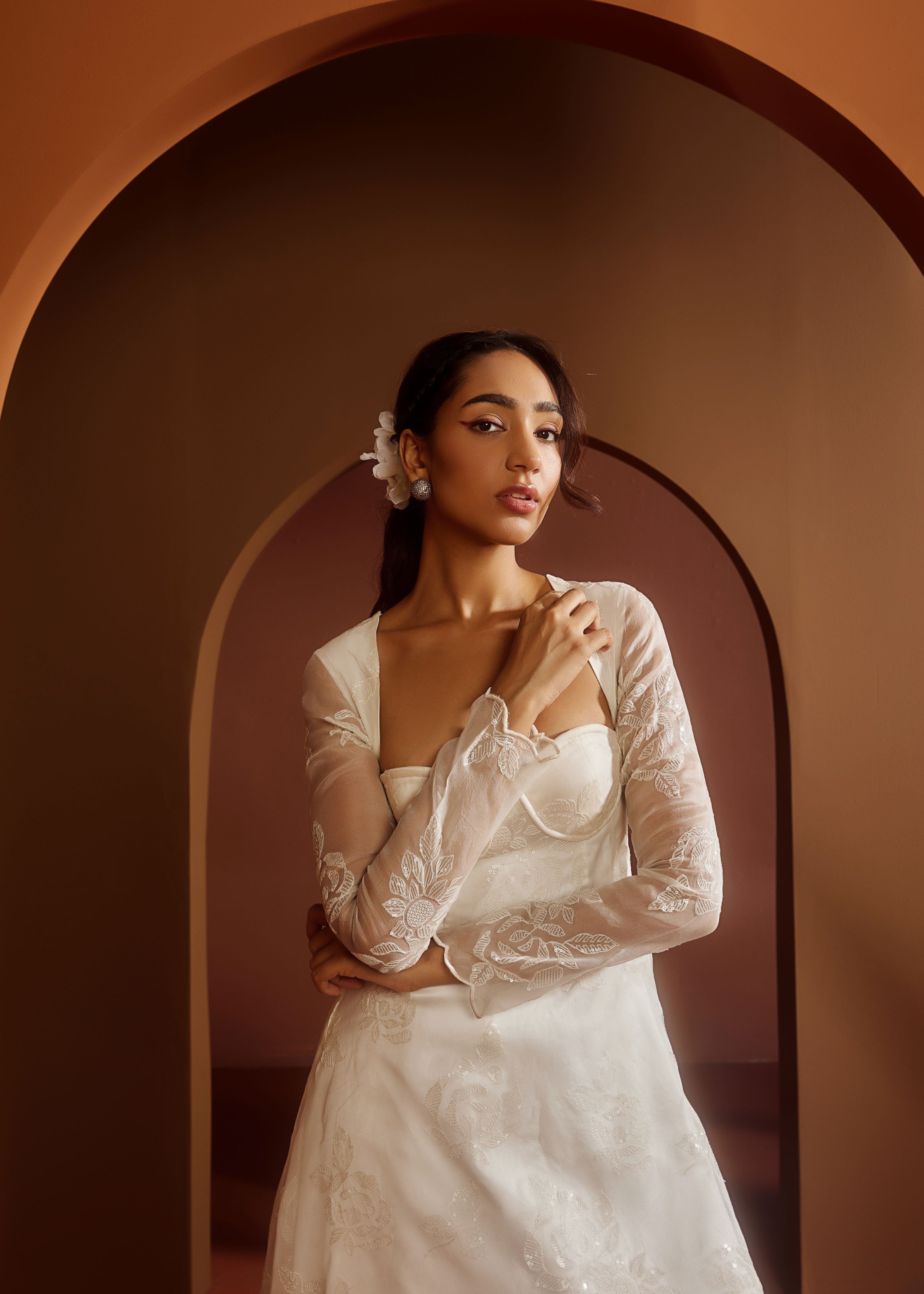 Avya White Embroidered Corset Anarkali Suit featuring intricate embroidery and a fitted corset design for a blend of traditional elegance and modern style
