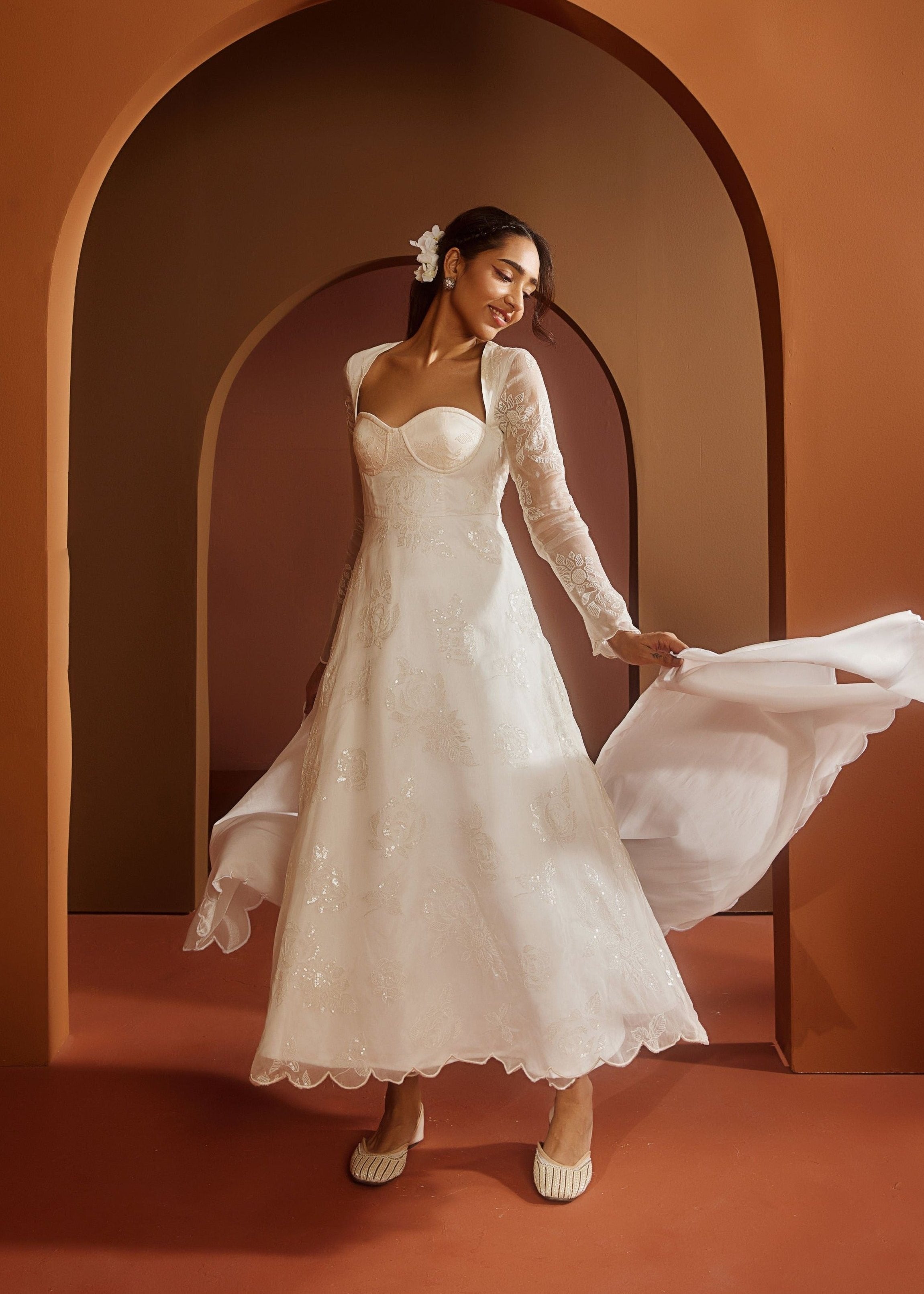 Avya White Embroidered Corset Anarkali Suit featuring intricate embroidery and a fitted corset design for a blend of traditional elegance and modern style