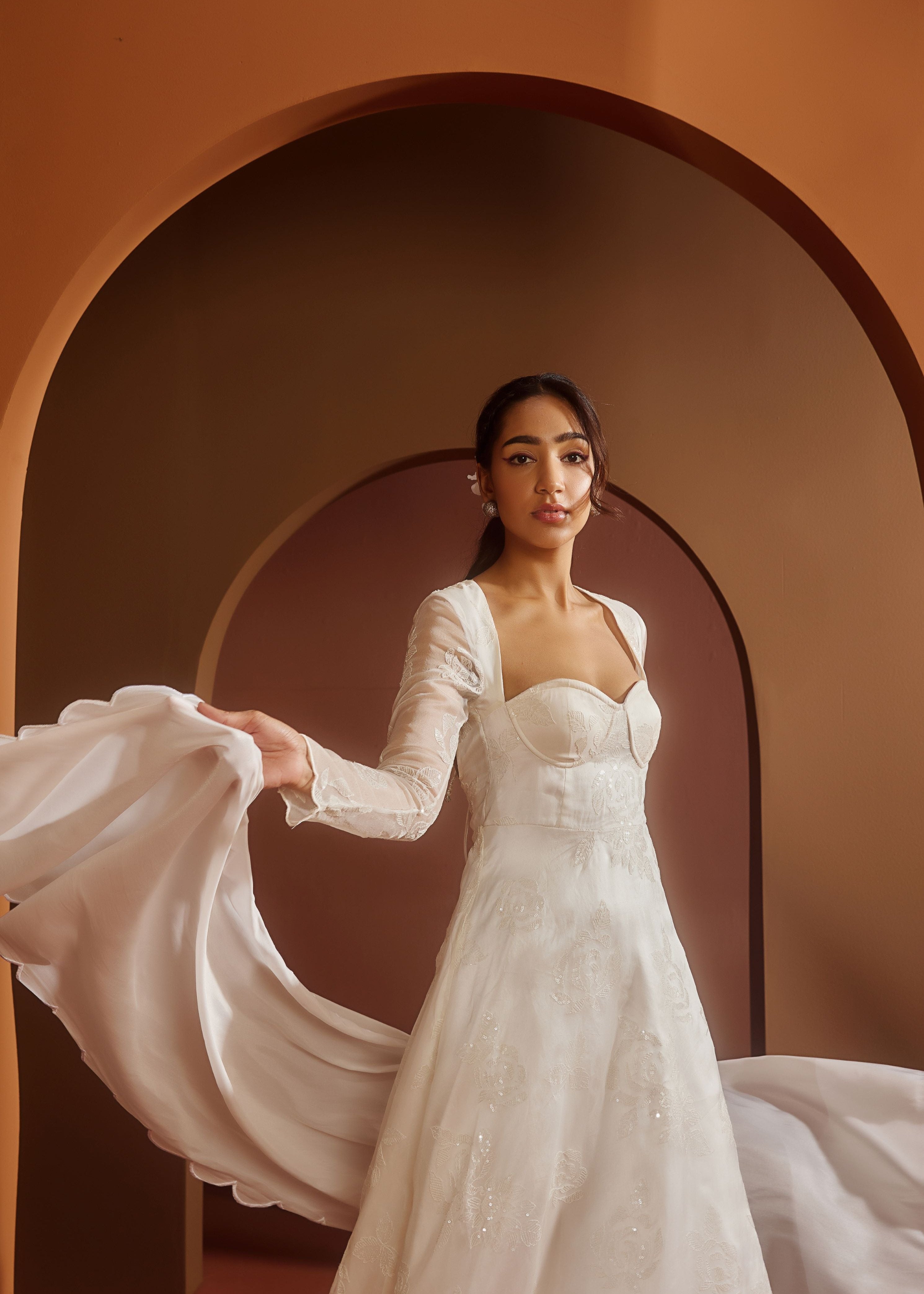 Avya White Embroidered Corset Anarkali Suit featuring intricate embroidery and a fitted corset design for a blend of traditional elegance and modern style