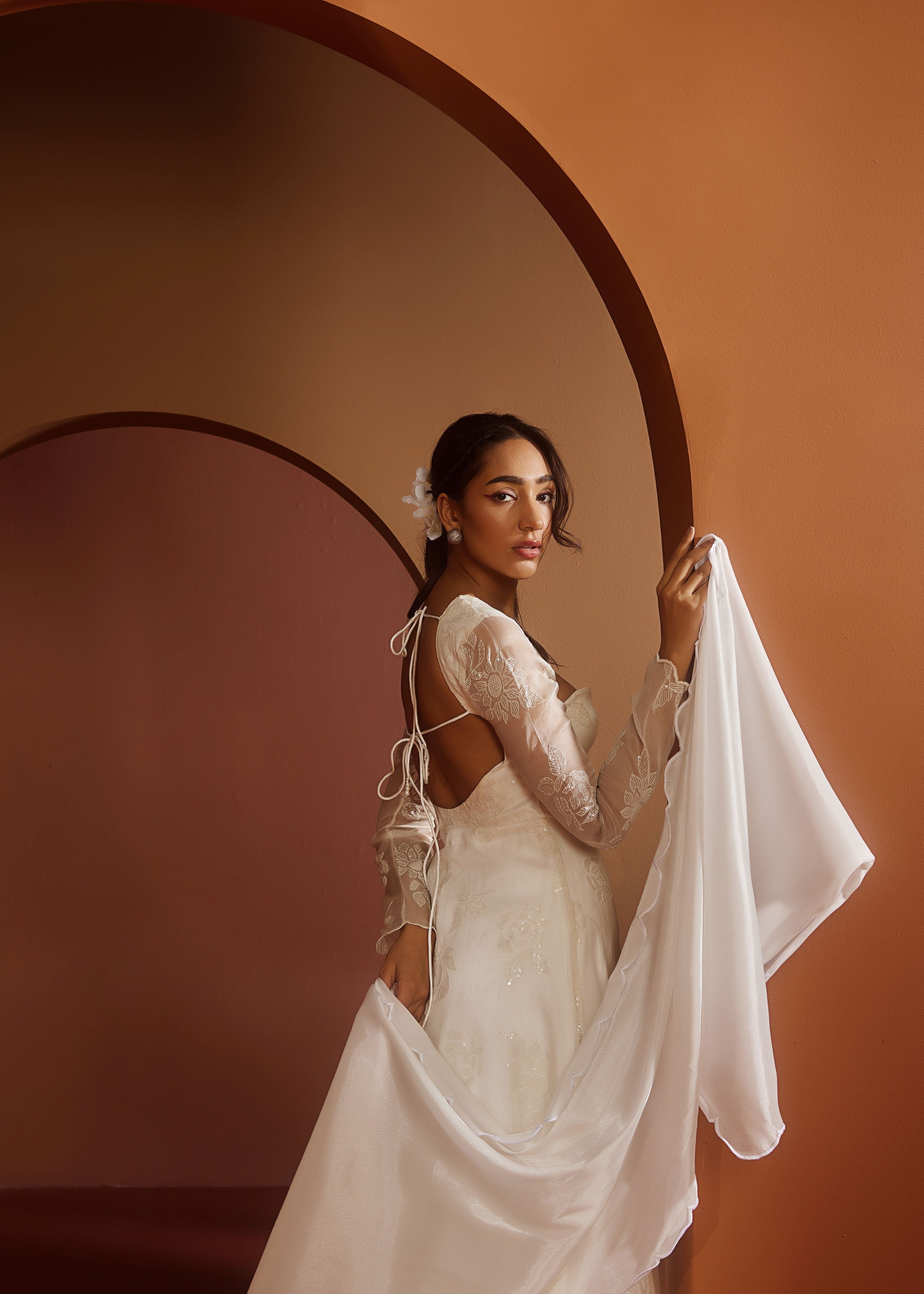 Avya White Embroidered Corset Anarkali Suit featuring intricate embroidery and a fitted corset design for a blend of traditional elegance and modern style