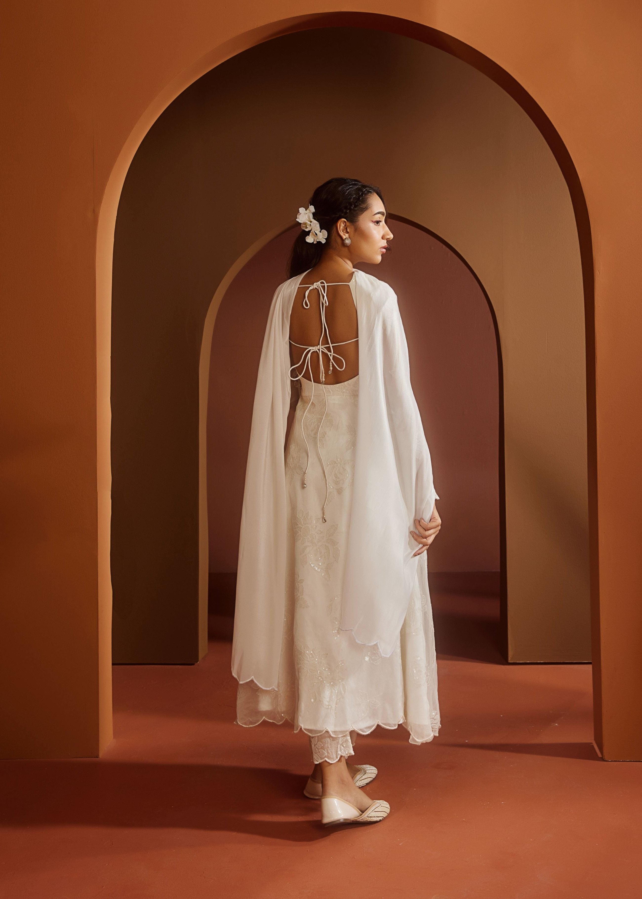 Avya White Embroidered Corset Anarkali Suit featuring intricate embroidery and a fitted corset design for a blend of traditional elegance and modern style