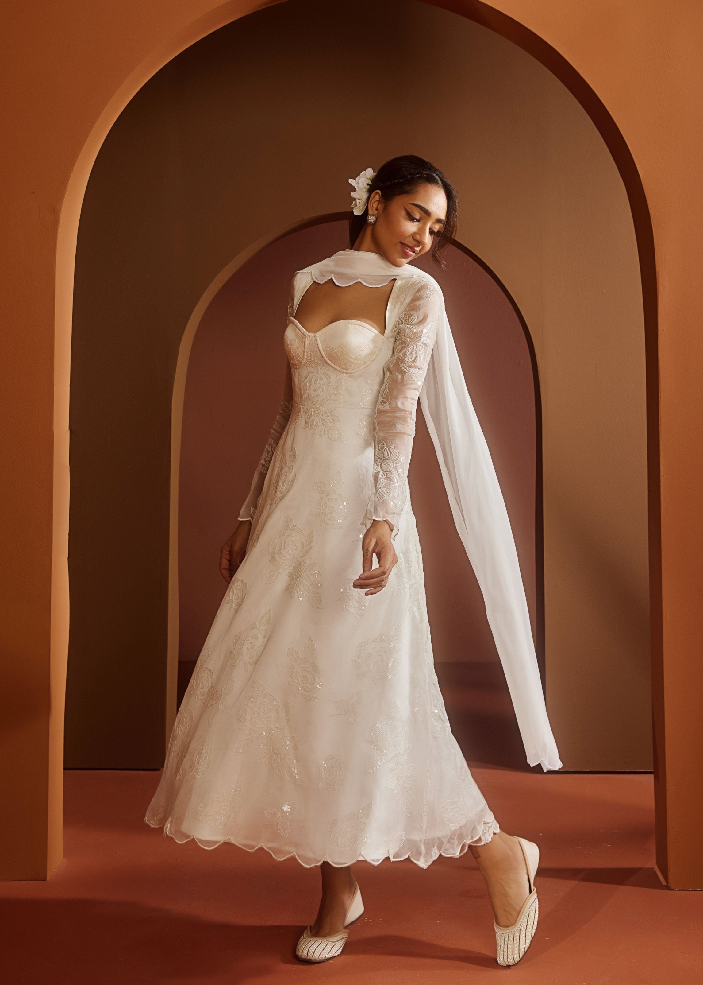 Avya White Embroidered Corset Anarkali Suit featuring intricate embroidery and a fitted corset design for a blend of traditional elegance and modern style