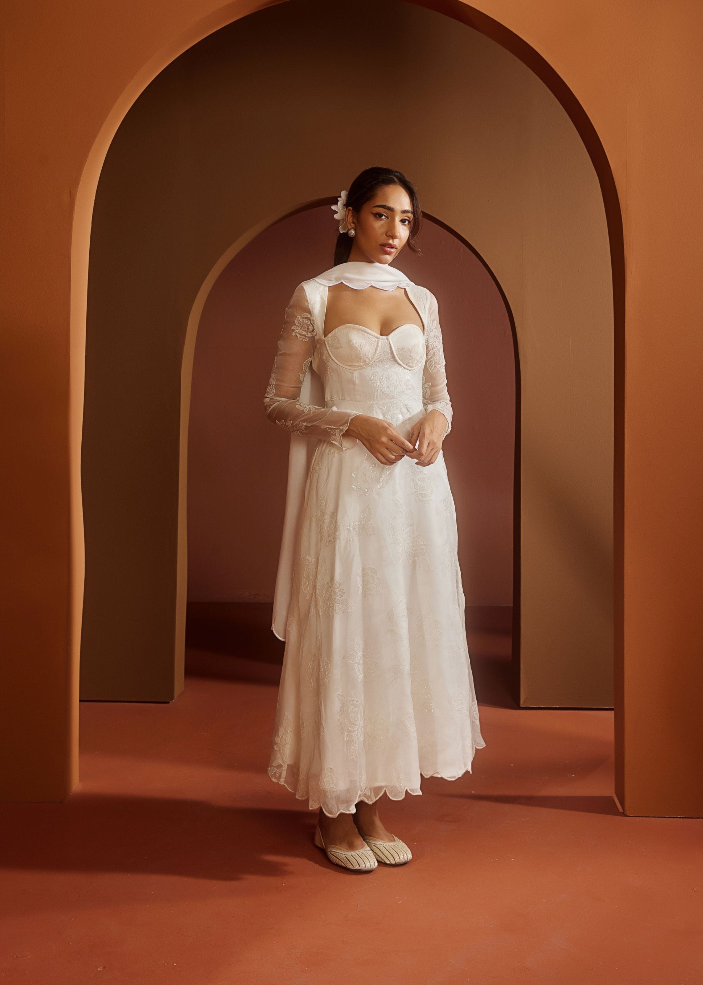 Avya White Embroidered Corset Anarkali Suit featuring intricate embroidery and a fitted corset design for a blend of traditional elegance and modern style