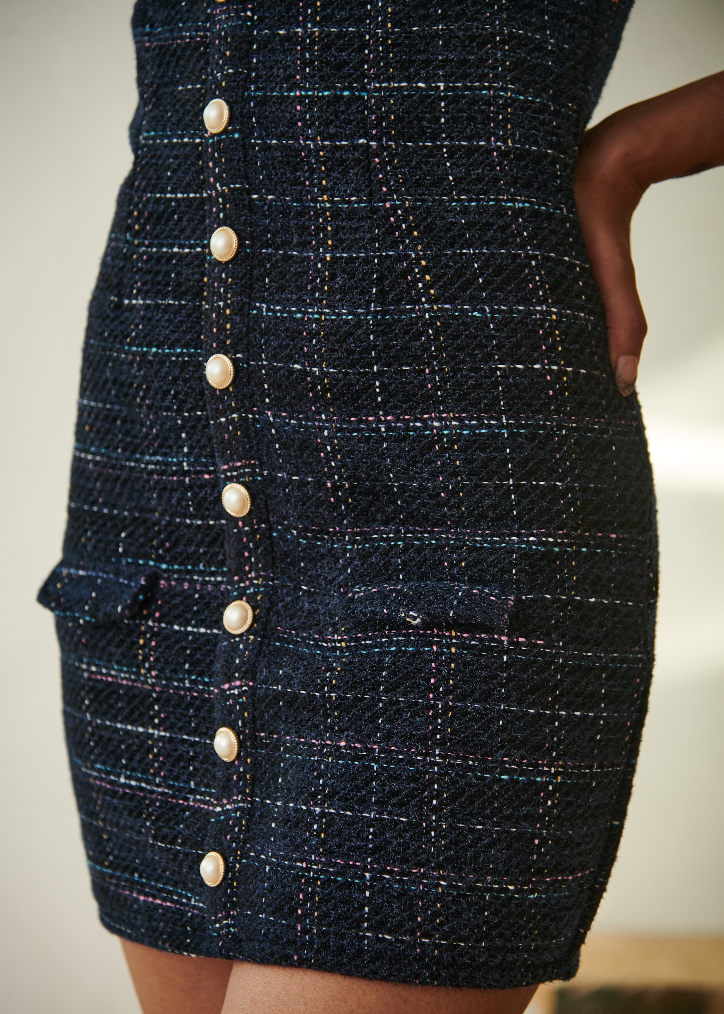 Elegant woman in a Barbara Blue Tweed Pinafore Dress and Organza Shirt Set, showcasing a blend of classic and contemporary style