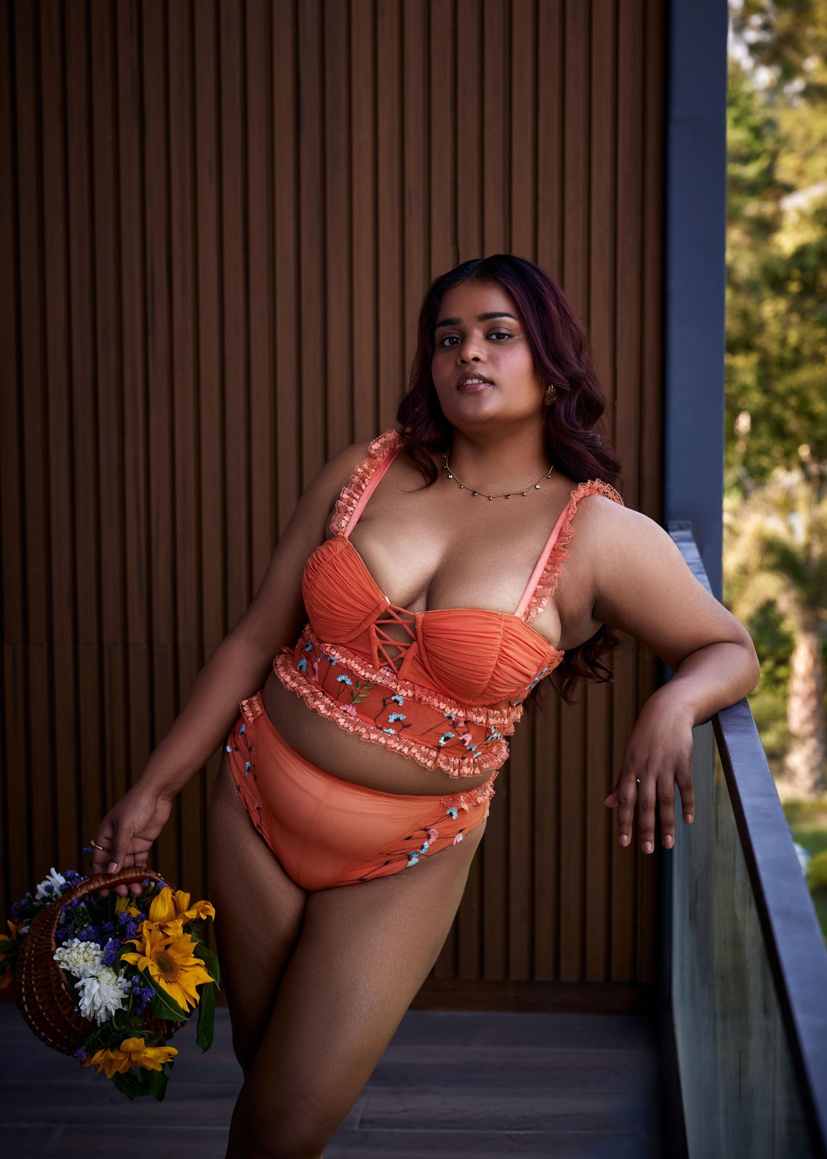 Cassandra Orange Floral Embroidered Balconet Bralette: A vibrant orange bralette adorned with floral embroidery, combining elegance and comfort.