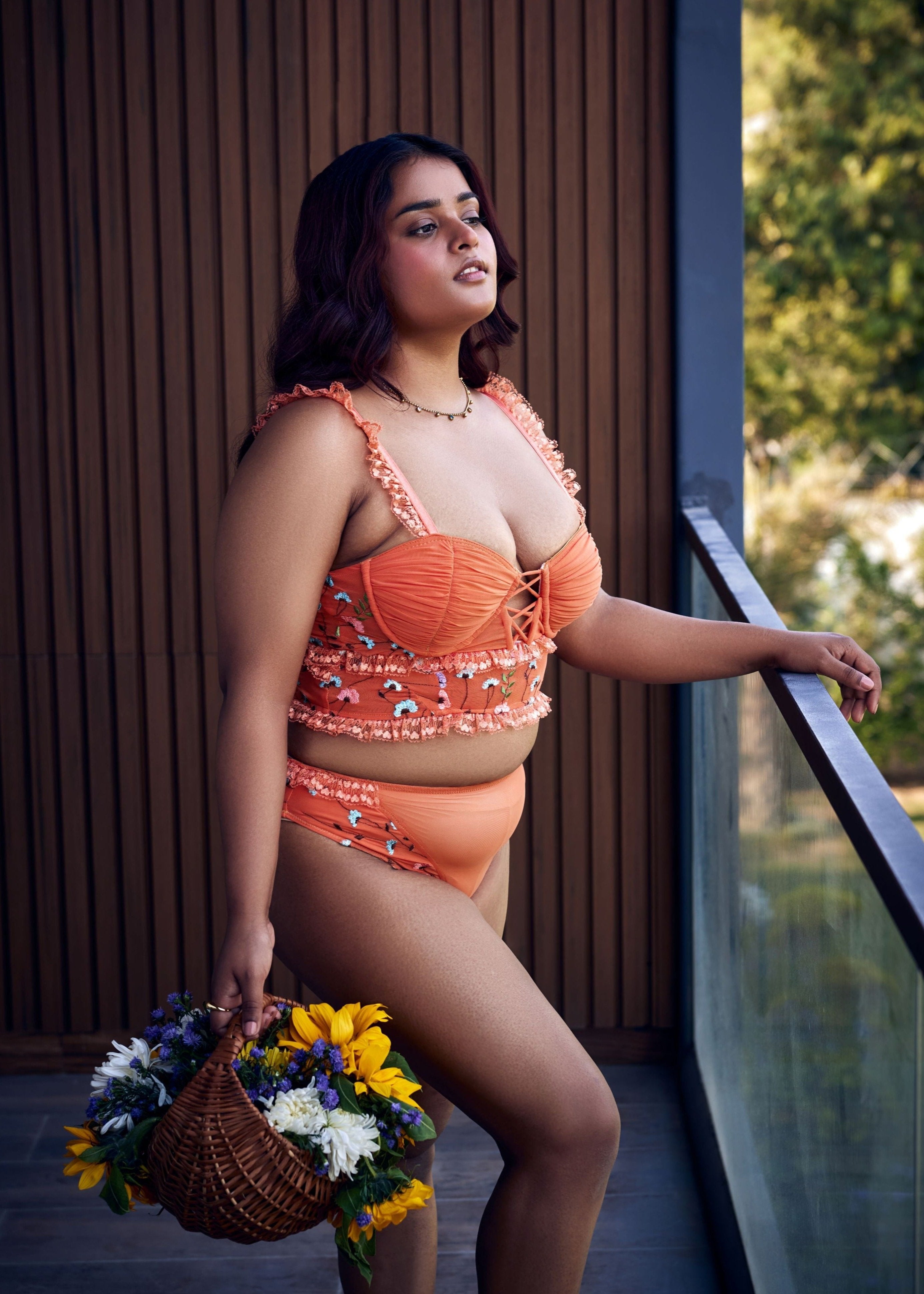"Cassandra Orange Floral Embroidered High-Rise Briefs with Intricate Detail."