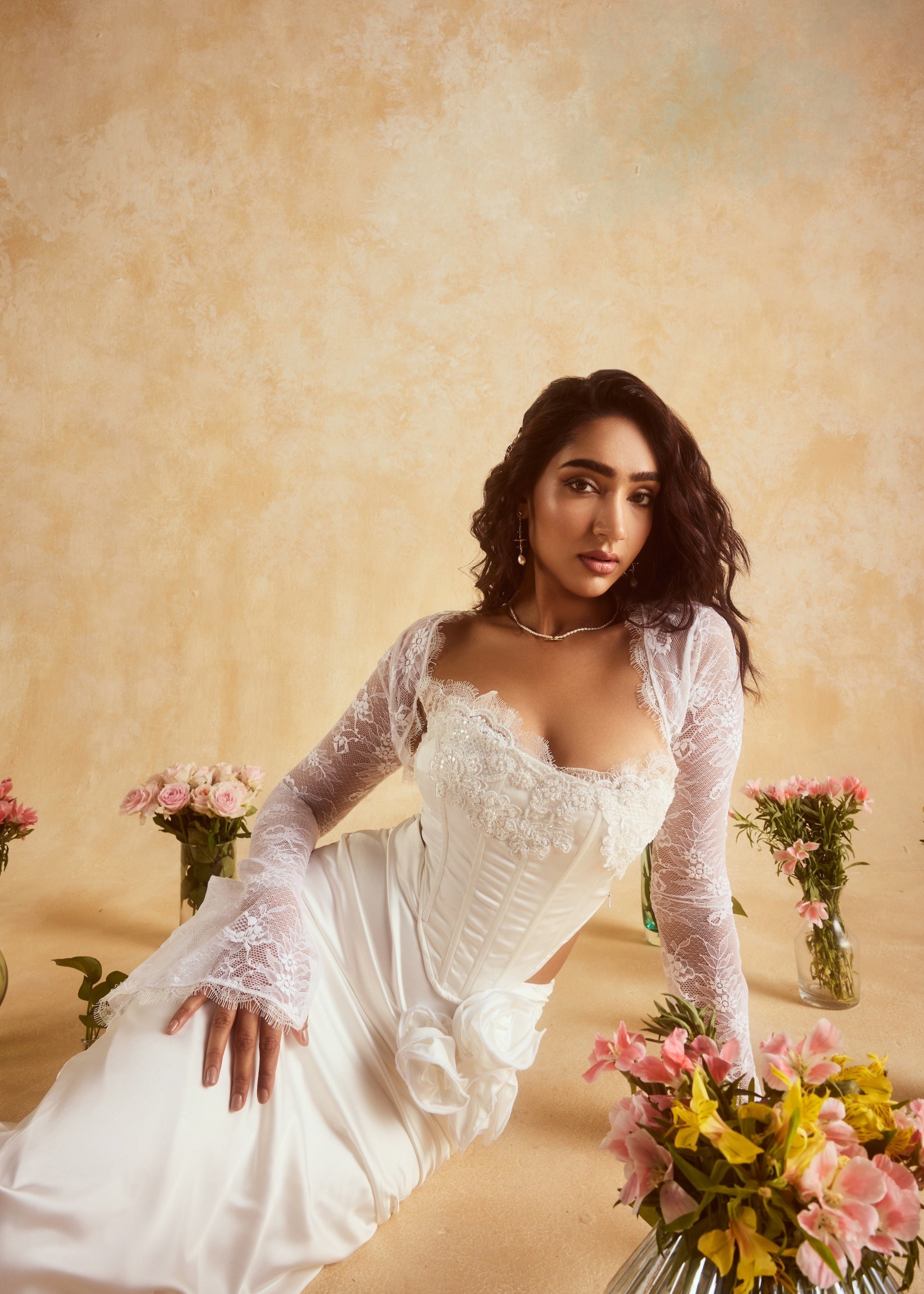 Cataleya White Embellished Corset and Skirt Set, featuring a stunning ensemble adorned with intricate embellishments in crisp white.