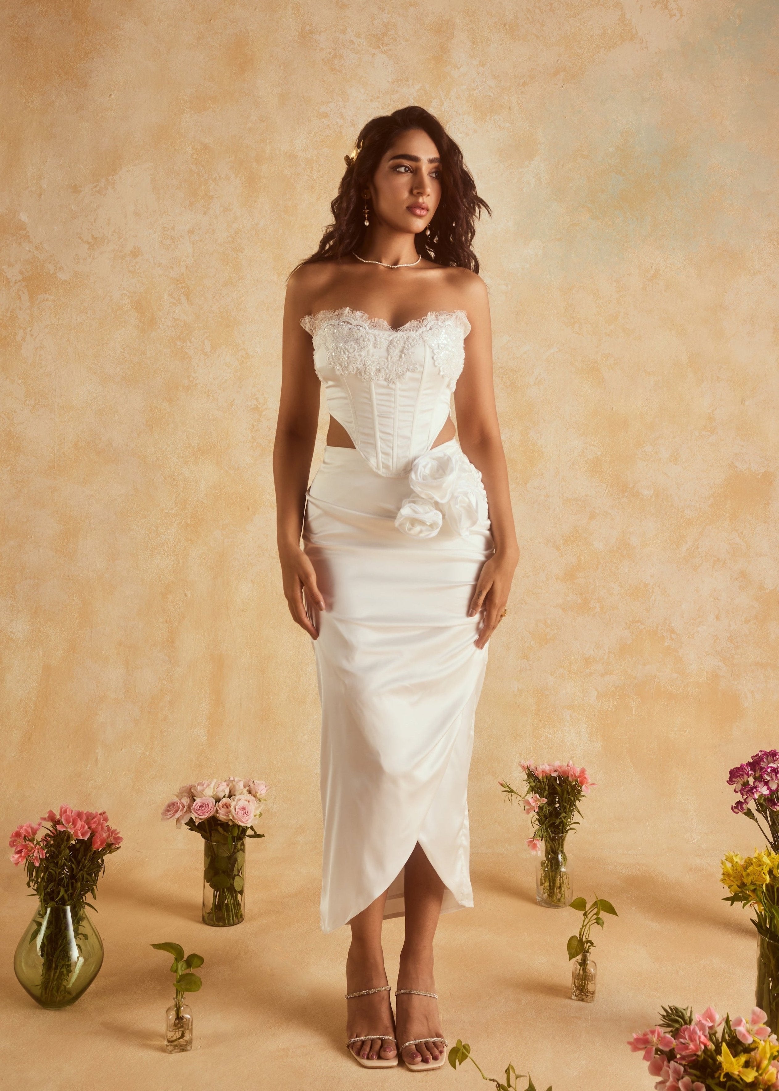 Cataleya White Embellished Corset and Skirt Set, featuring a stunning ensemble adorned with intricate embellishments in crisp white.