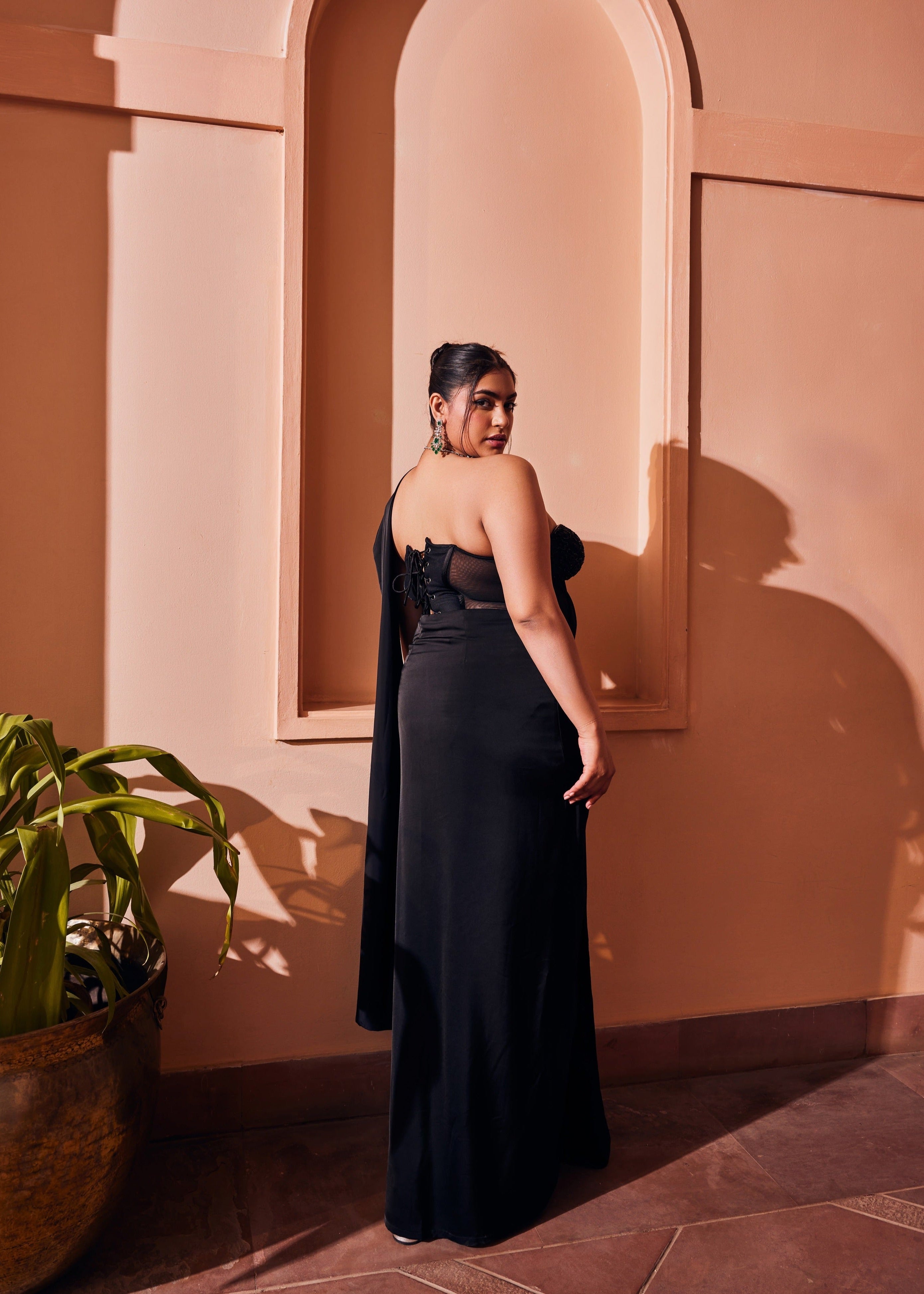 Fida Black Corset Blouse and Saree Set combining a chic black corset blouse with a coordinating saree