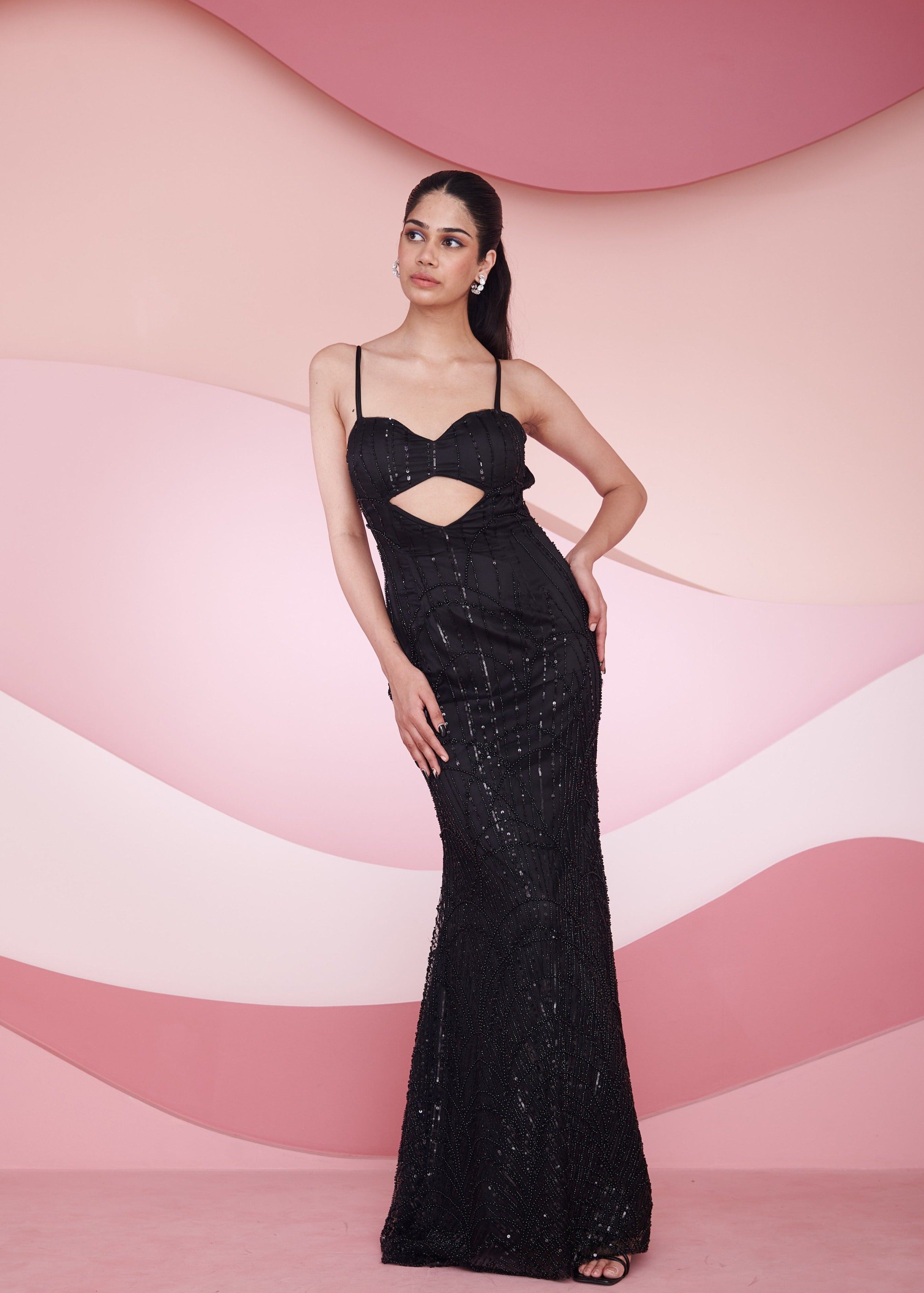 Stunning woman in a Georgia Black Hand Embroidered Backless Gown displaying elegance and sophistication