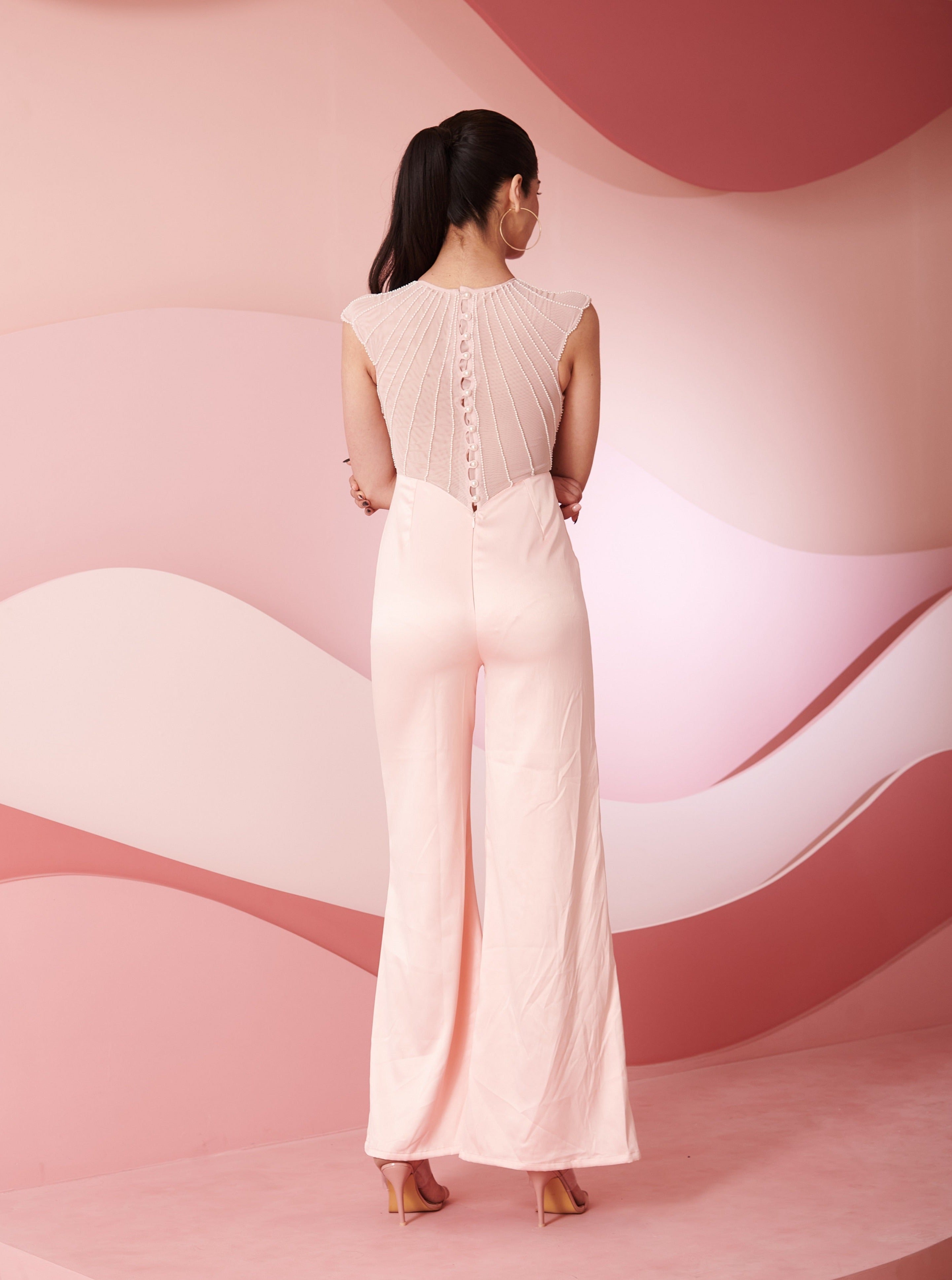 Ilona blush pink embroidered jumpsuit featuring intricate embroidery, perfect for an elegant and stylish appearance.