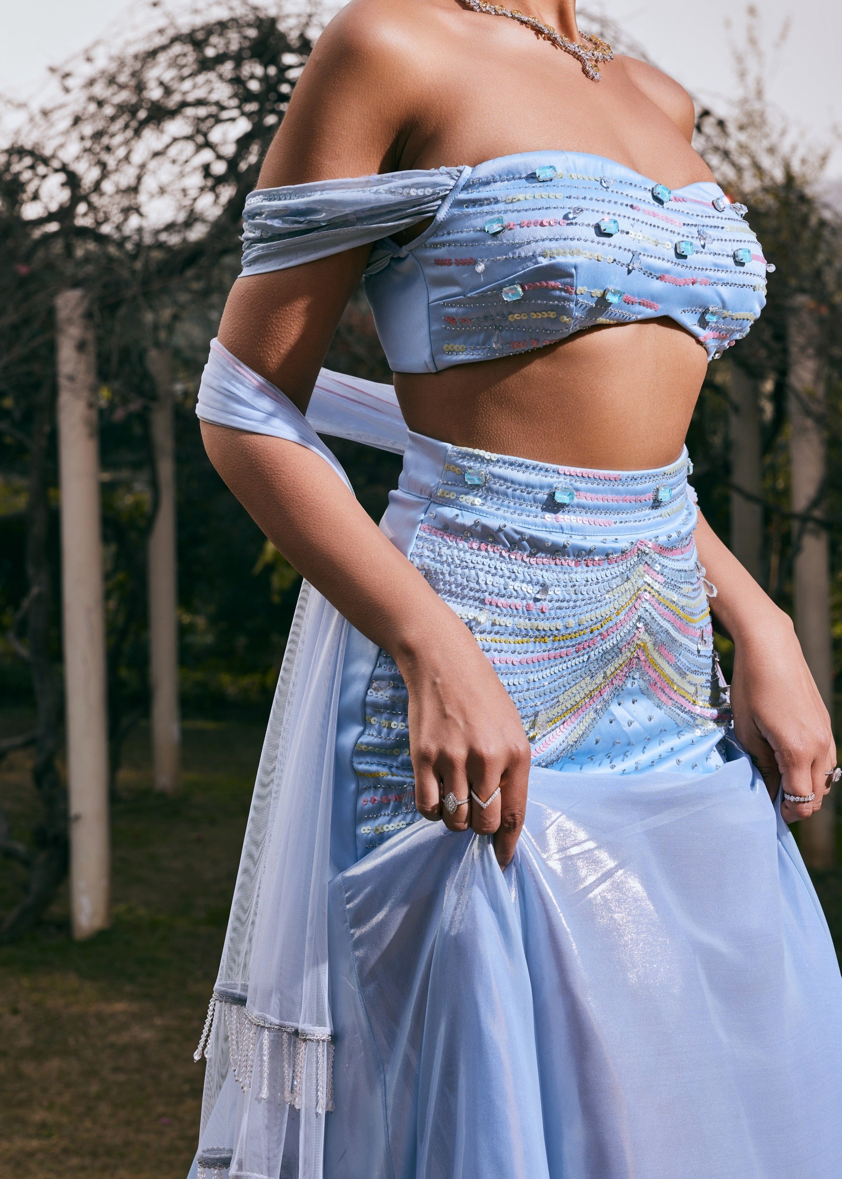 Jasmine Powder Blue Satin and Shimmer Chiffon Lehenga Set featuring a blend of satin and shimmer chiffon in a soft powder blue hue