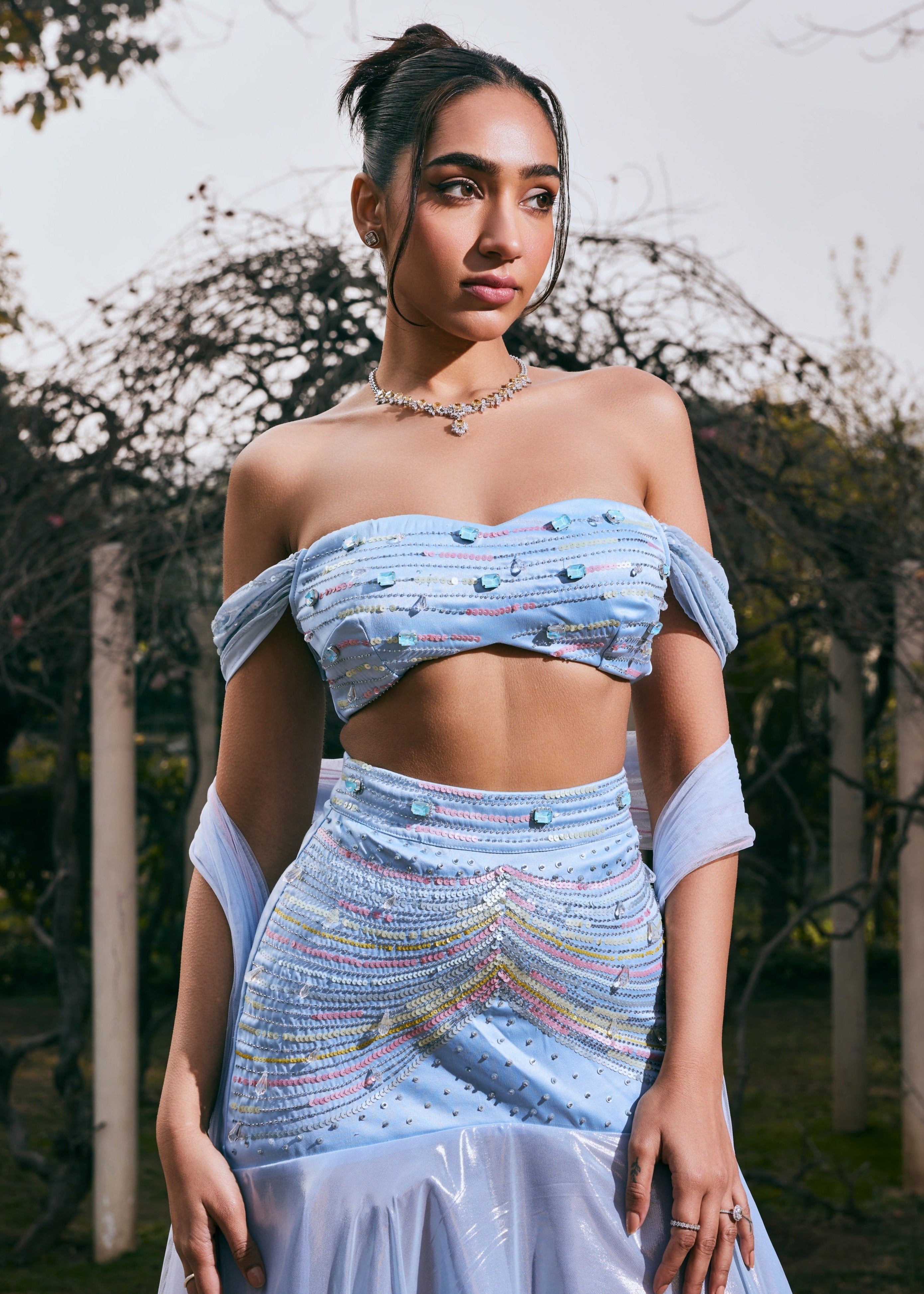 Jasmine Powder Blue Satin and Shimmer Chiffon Lehenga Set featuring a blend of satin and shimmer chiffon in a soft powder blue hue