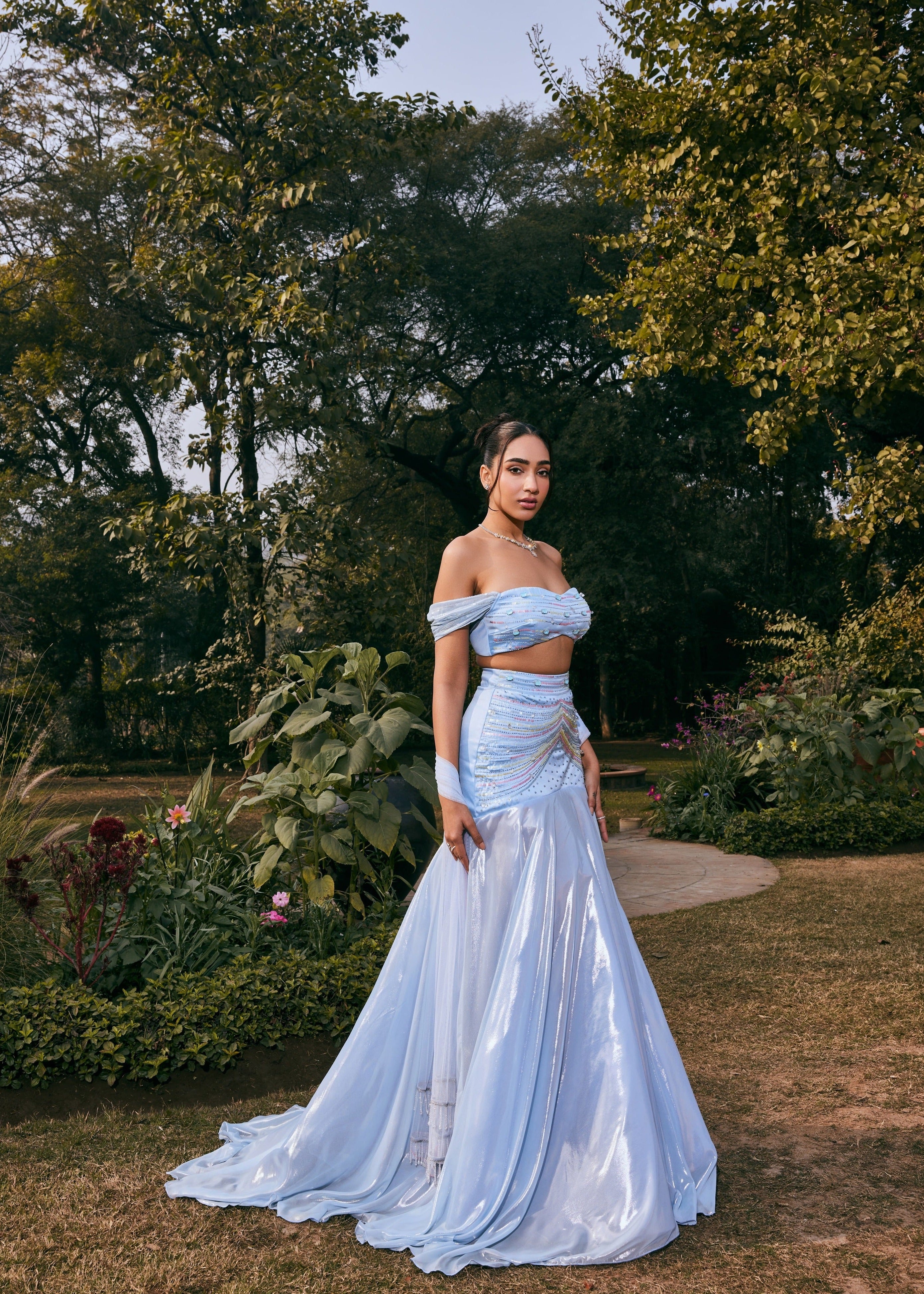 Jasmine Powder Blue Satin and Shimmer Chiffon Lehenga Set featuring a blend of satin and shimmer chiffon in a soft powder blue hue