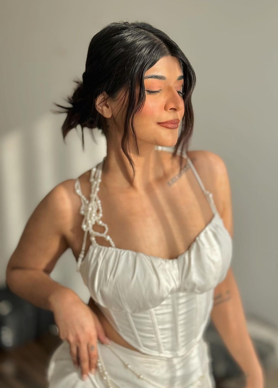 White Satin and Pearl Embroidered Corset Set with elegant satin fabric and delicate pearl embroidery.