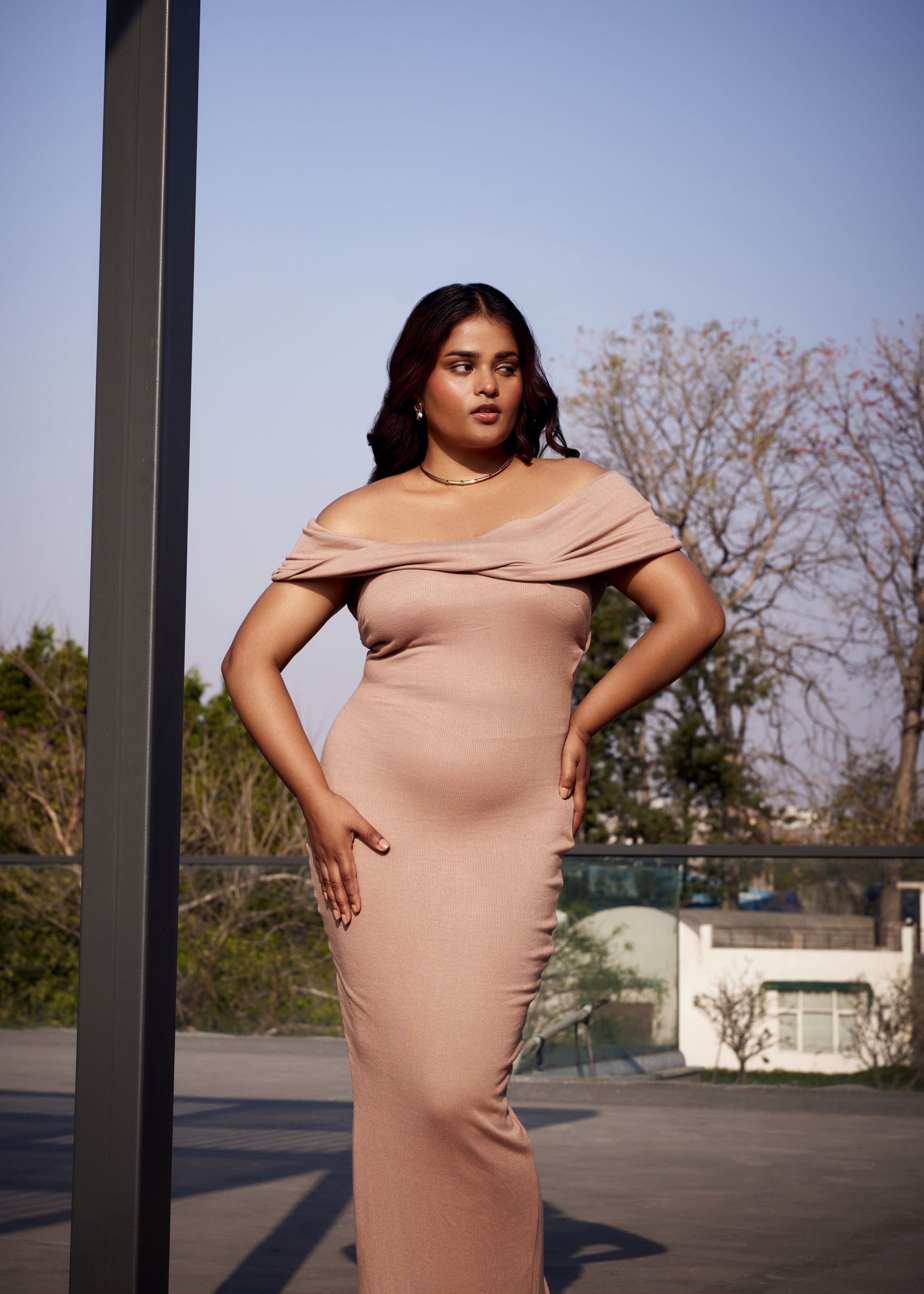 Madilyn Nude Off-Shoulder Modal Rib Maxi Dress: A graceful nude maxi dress with an off-shoulder neckline and ribbed modal fabric, ideal for a sophisticated and comfortable look.