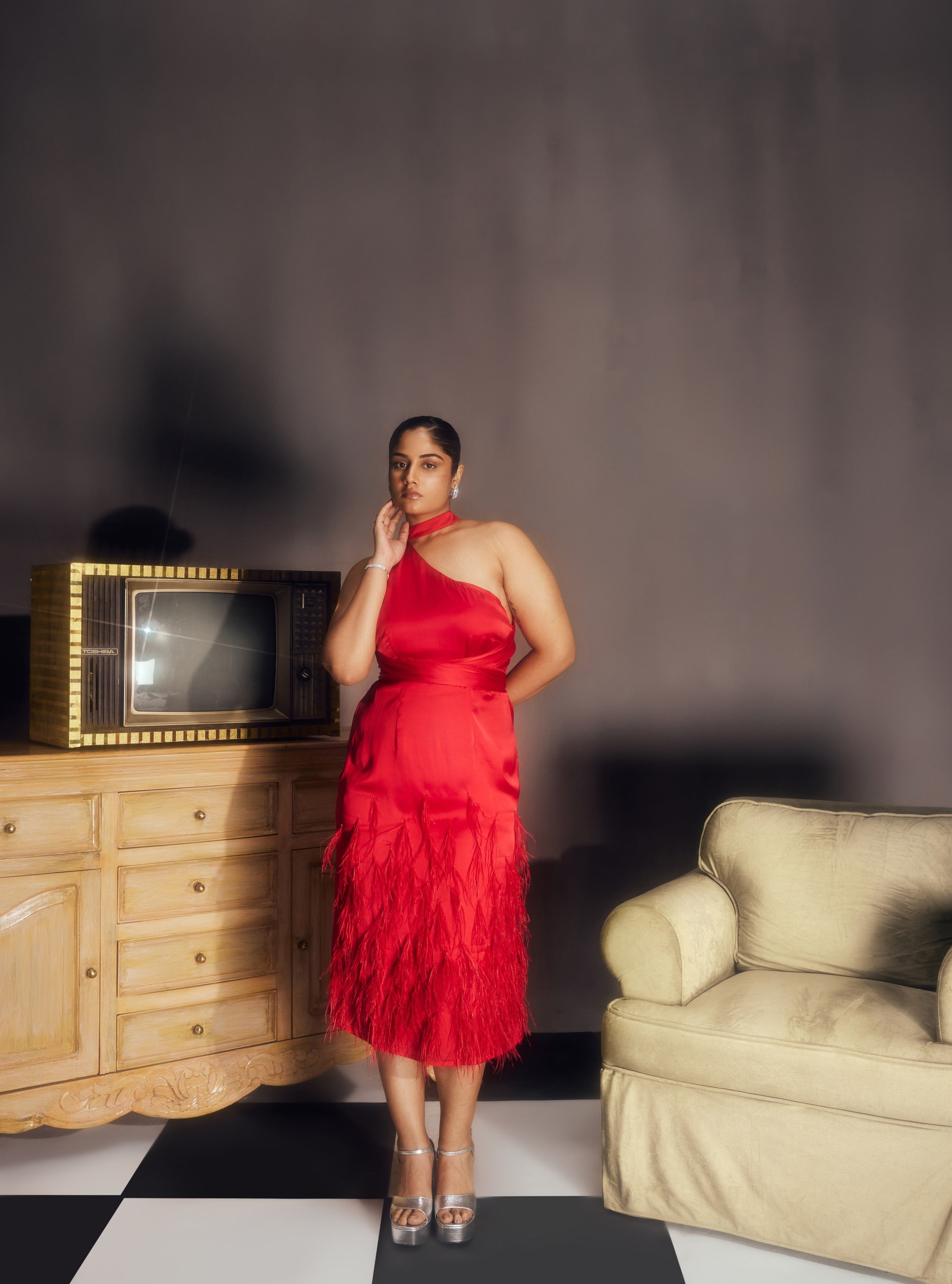 Michaela Red Satin Feather Midi Dress, combining luxurious satin fabric with dramatic feather accents for a striking look