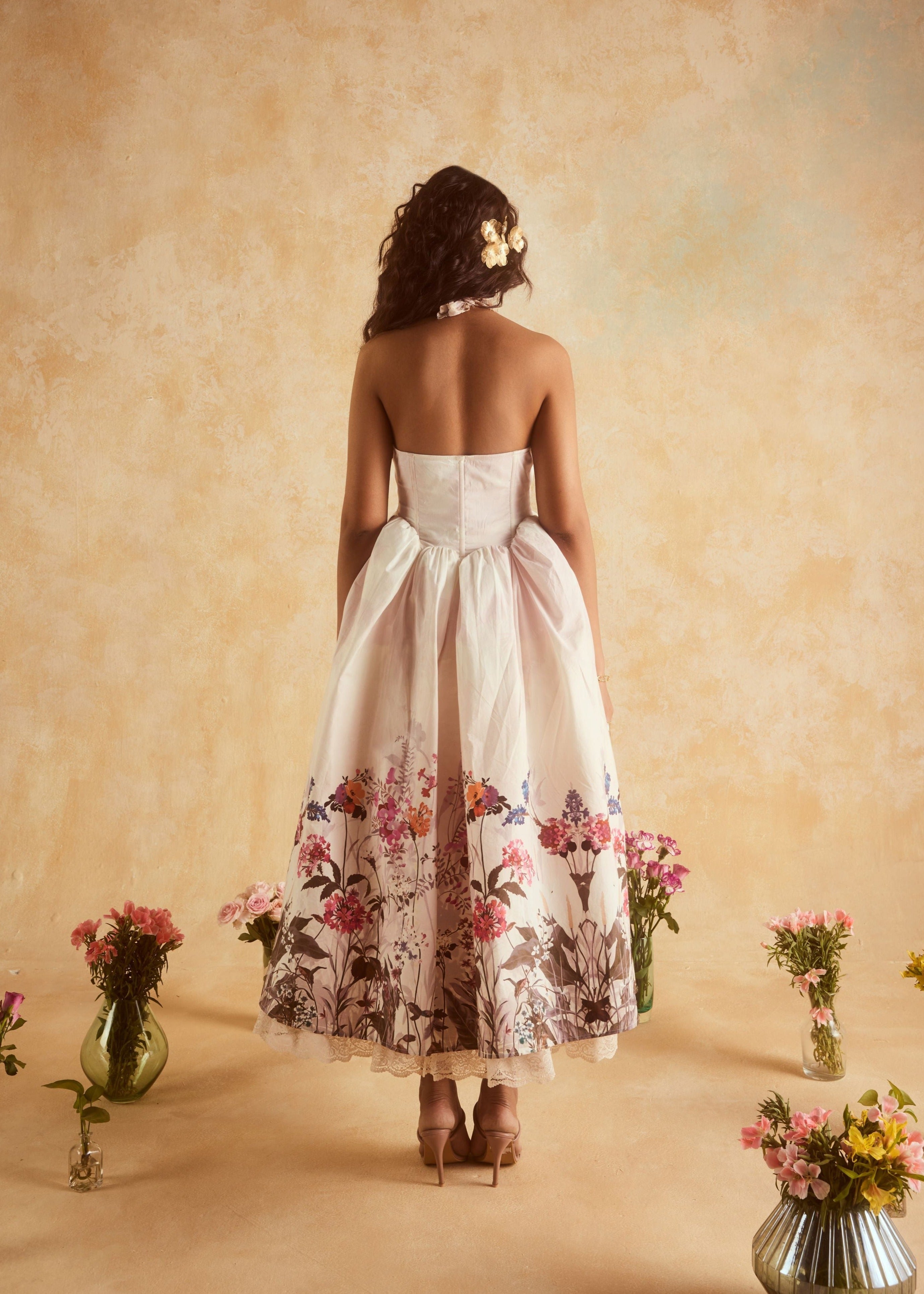 "Stylish Oaklynn White Floral Corset Halter Midi Dress with a Flattering Silhouette."
