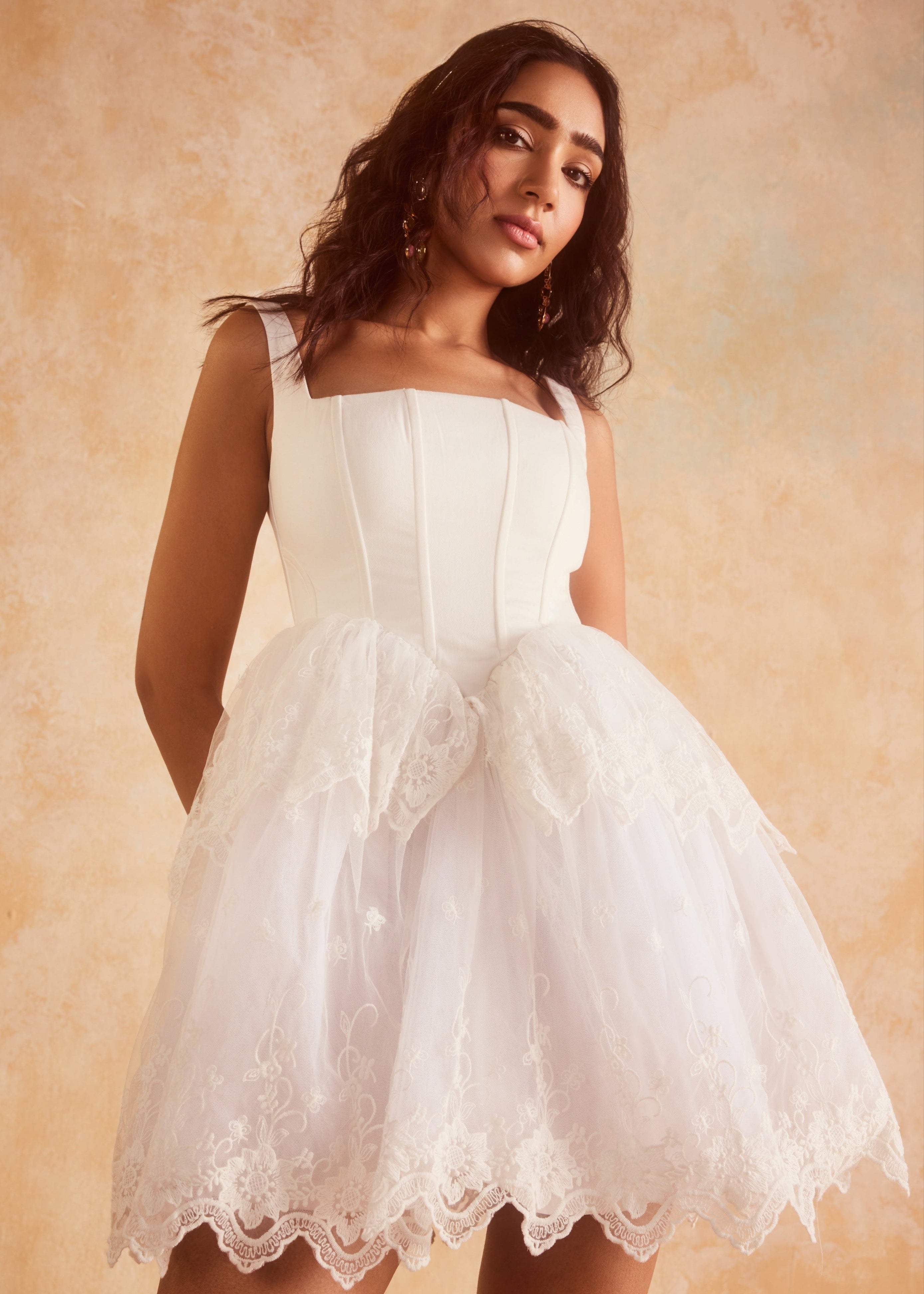 Ophelia White Embroidered Puff Mini Corset Dress with intricate embroidery and a puff silhouette in elegant white.