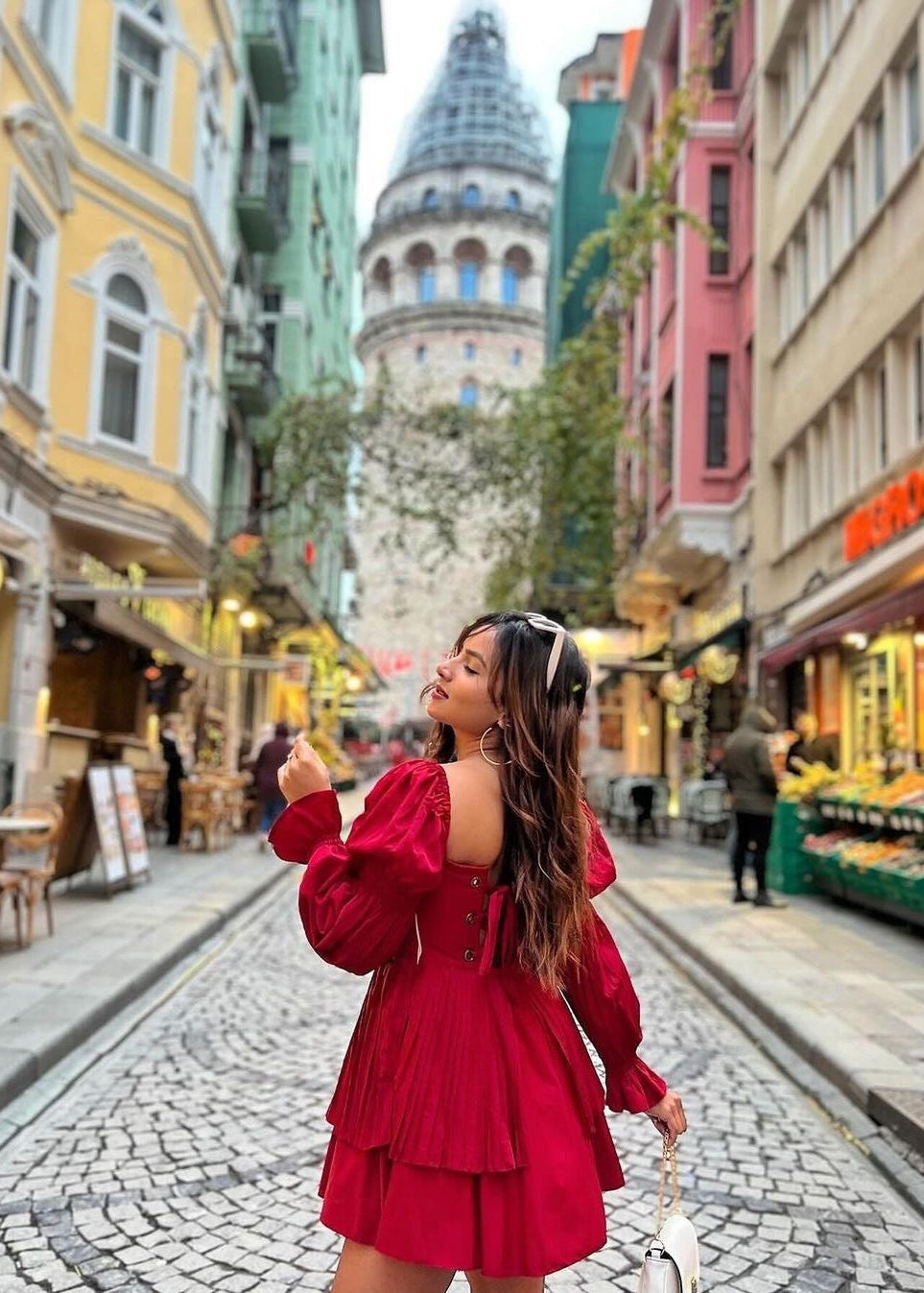 Pixie Burgundy Puff Corset Dress, featuring a dramatic puff design and a flattering corset bodice