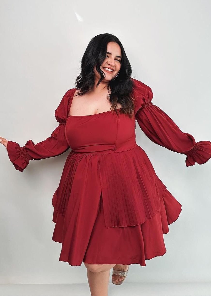 Pixie Burgundy Puff Corset Dress featuring a rich burgundy color and dramatic puff sleeves.