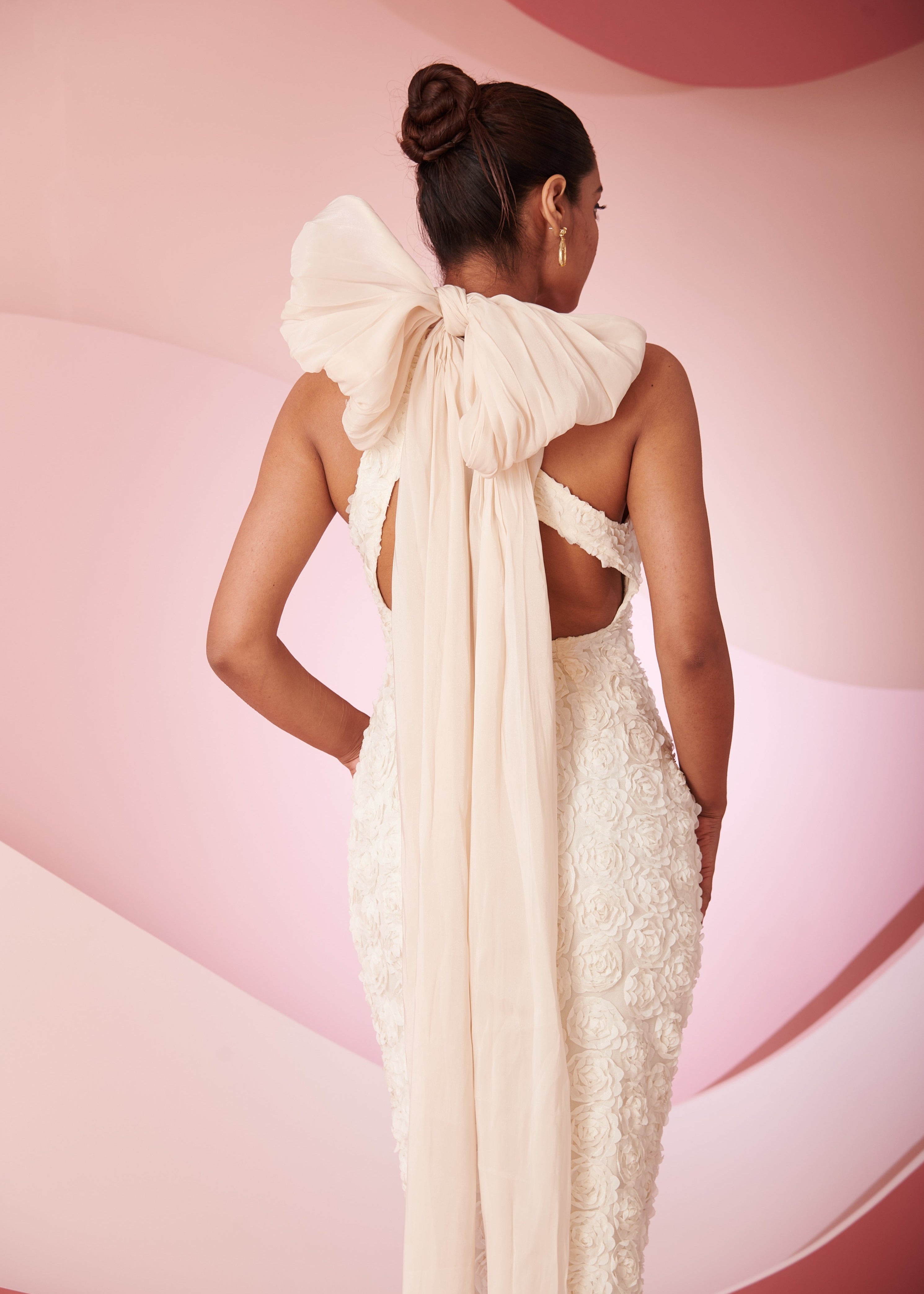 Rabia ivory 3D floral embroidered cutout gown featuring dimensional floral details and stylish cutouts, perfect for a striking and elegant look.