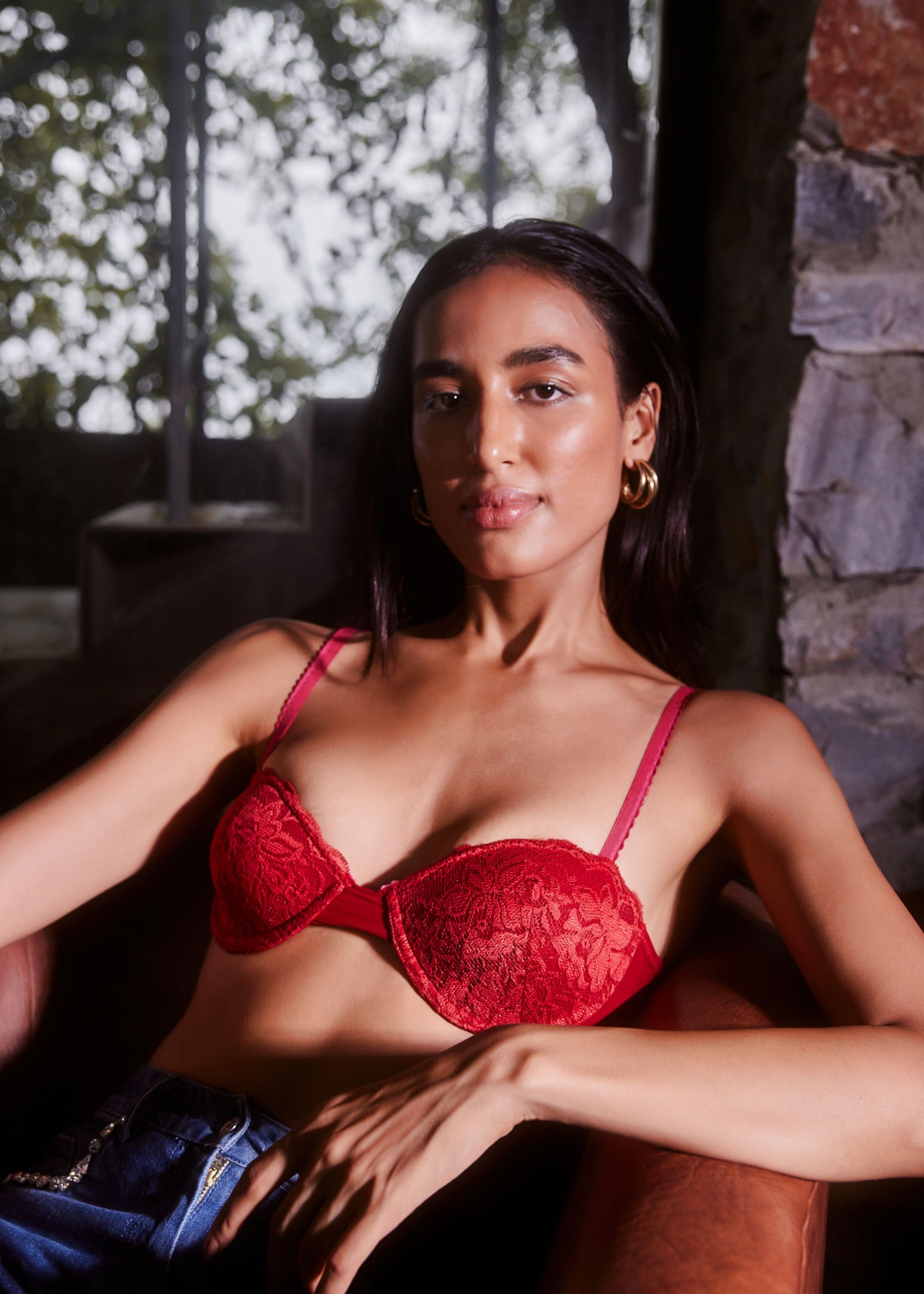 The Ruby Red Lace Plunge Balconette Bra features a vibrant red hue with elegant lace detailing and a plunging neckline for a flattering and bold look