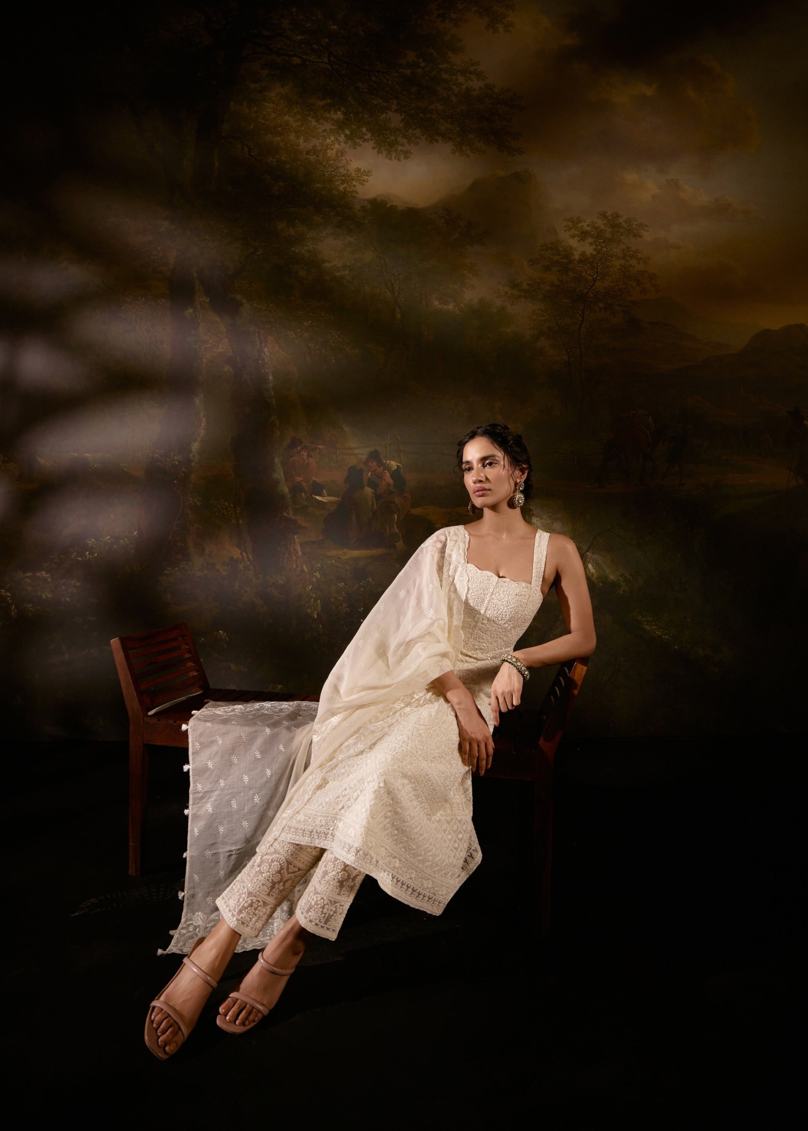 "Sajoon White Organza Chikankari Corset Anarkali Suit Set: Elegant Anarkali suit set in white organza with Chikankari embroidery and a corset design."