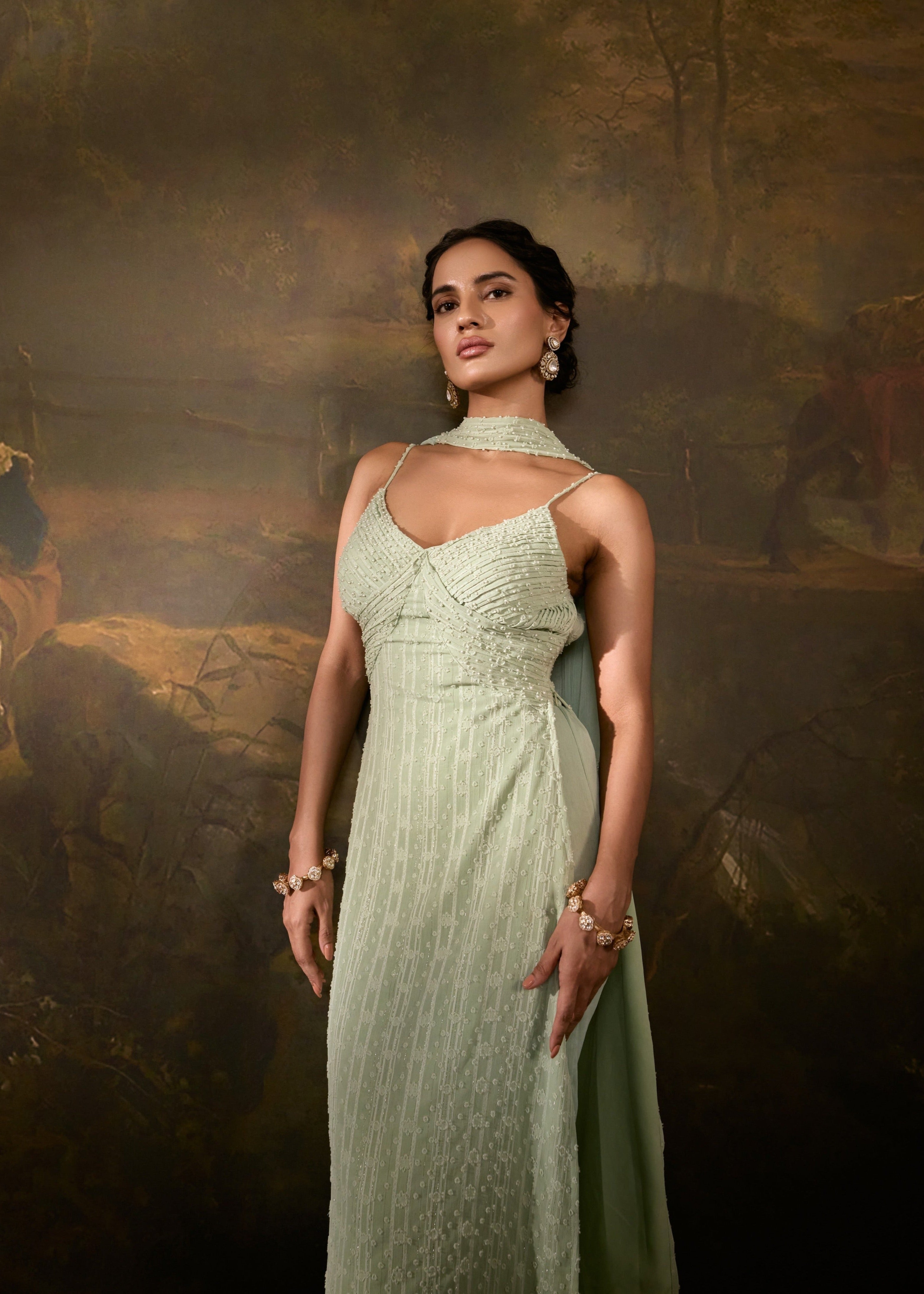 "Shimaz Sage Green Sleeveless Suit: Elegant sleeveless suit in sage green, offering a chic and modern look."