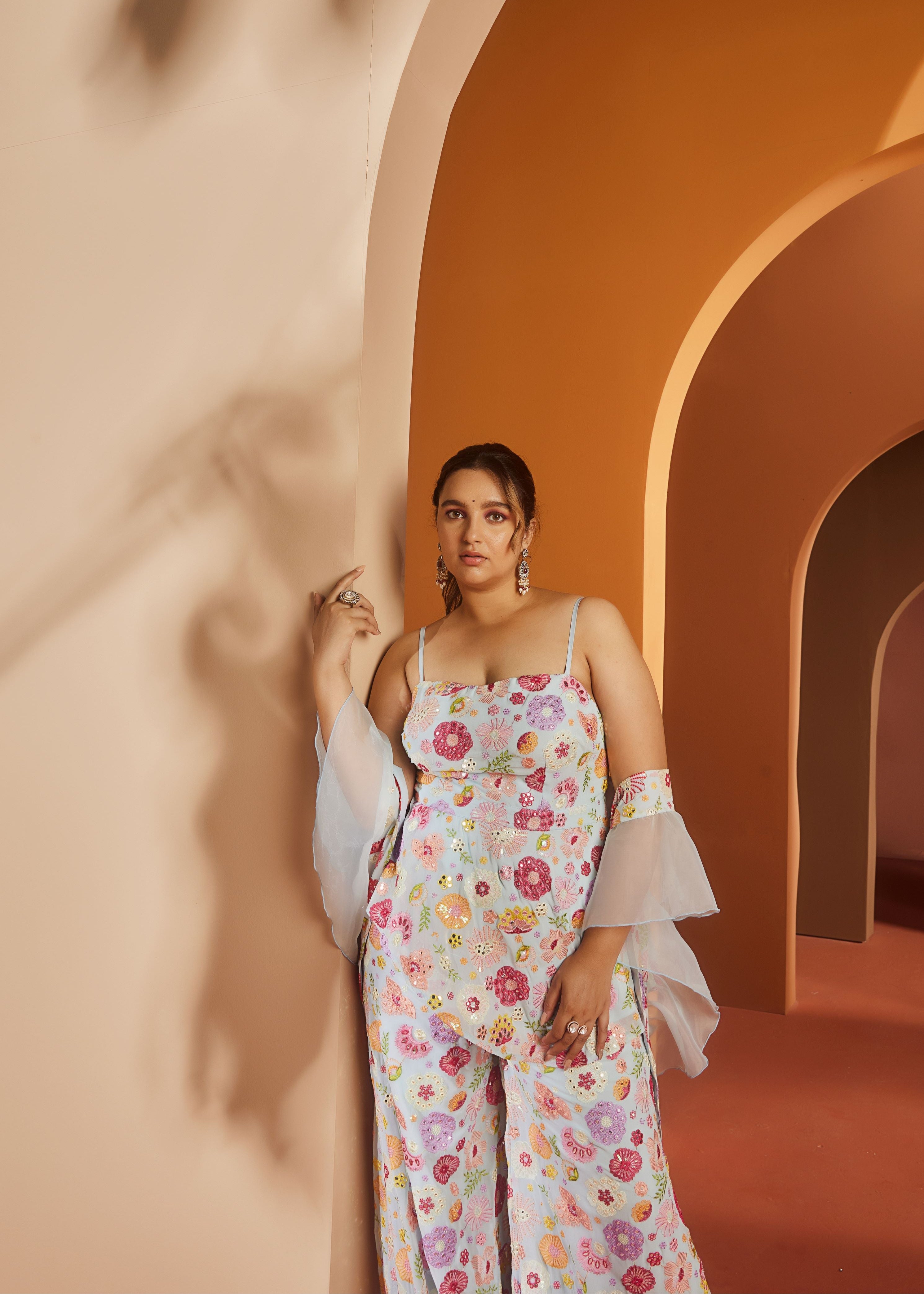 Shyla Baby Blue Embroidered Sharara Set with intricate embroidery on a soft blue fabric for a chic and graceful look