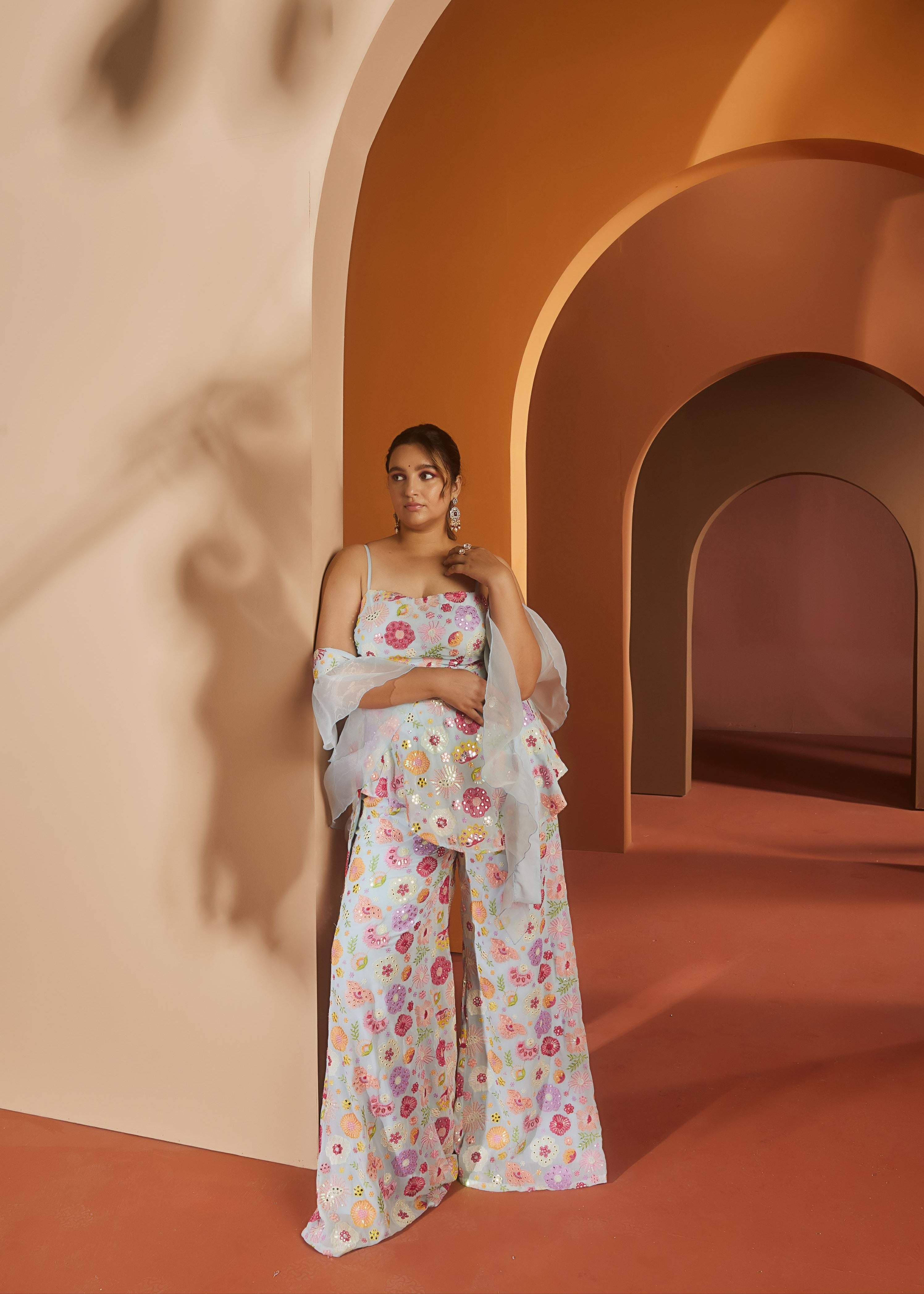 Shyla Baby Blue Embroidered Sharara Set with intricate embroidery on a soft blue fabric for a chic and graceful look