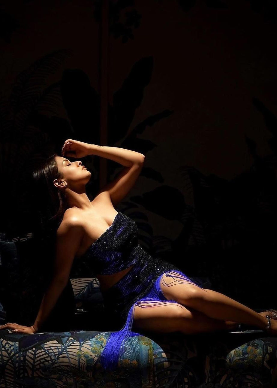 Siona Blue Shine Tassel Dress with a shimmering blue fabric and stylish tassel details.