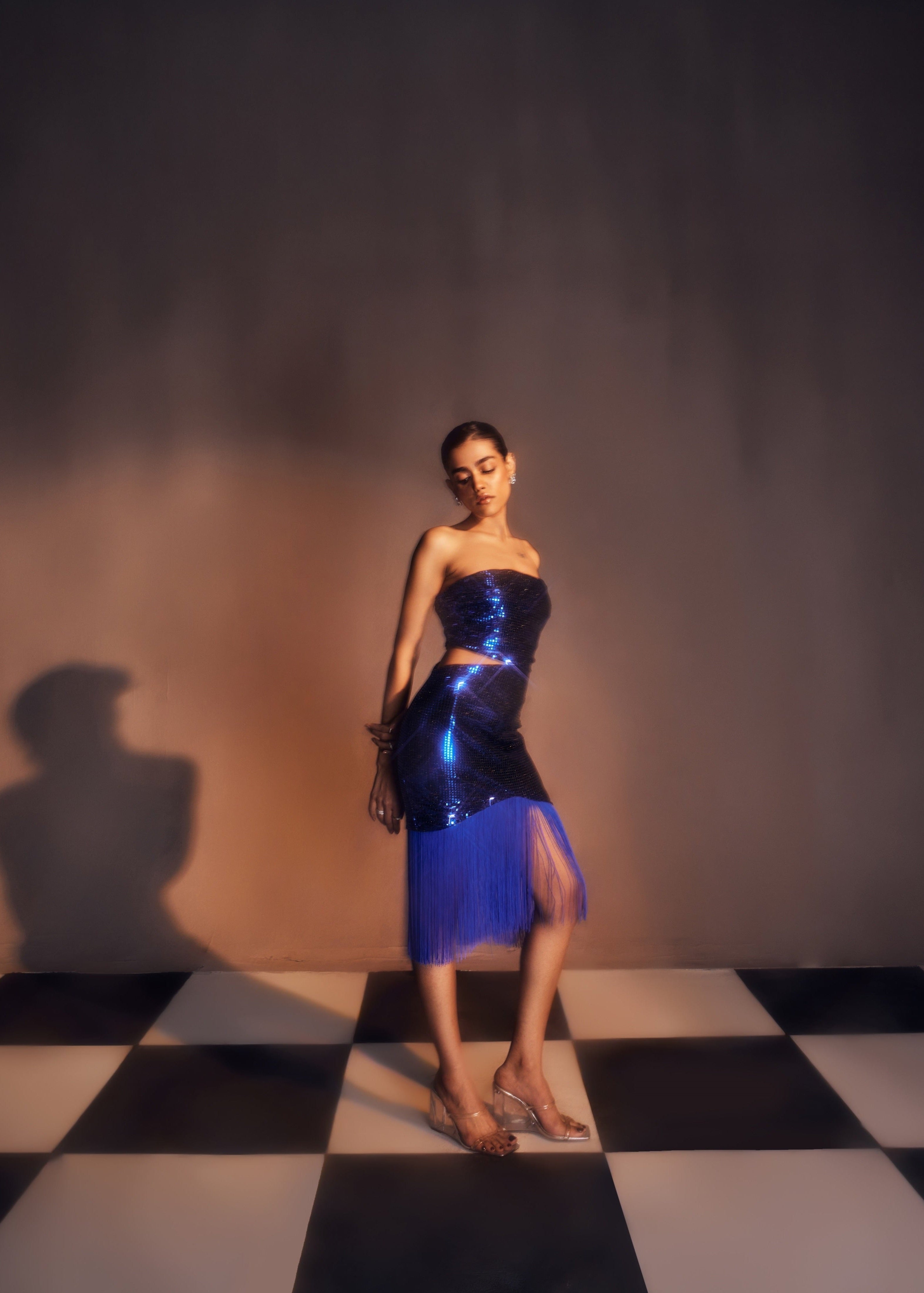 Siona blue shine tassel dress with a shimmering finish and playful tassel detailing