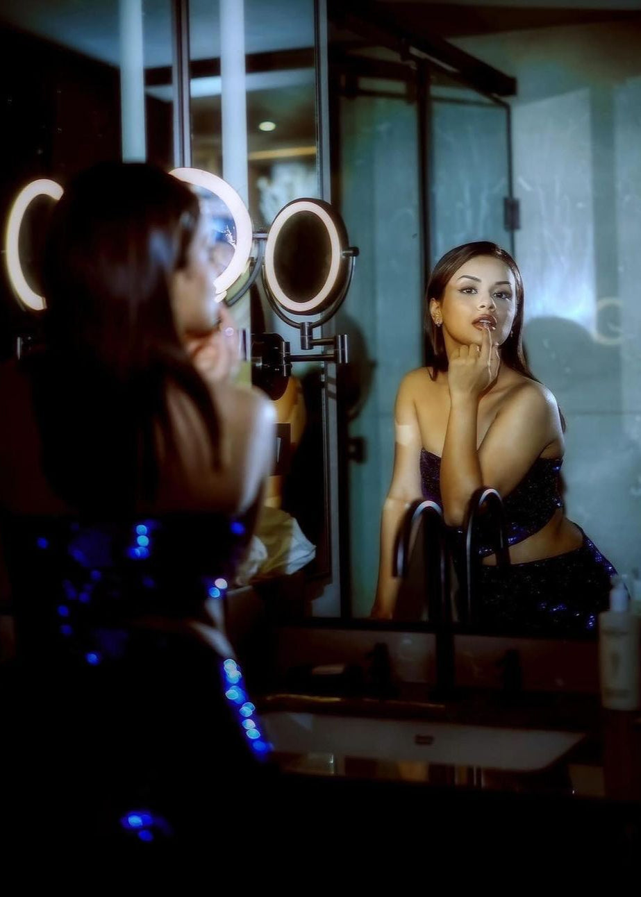 Siona Blue Shine Tassel Dress with a shimmering blue fabric and stylish tassel details.