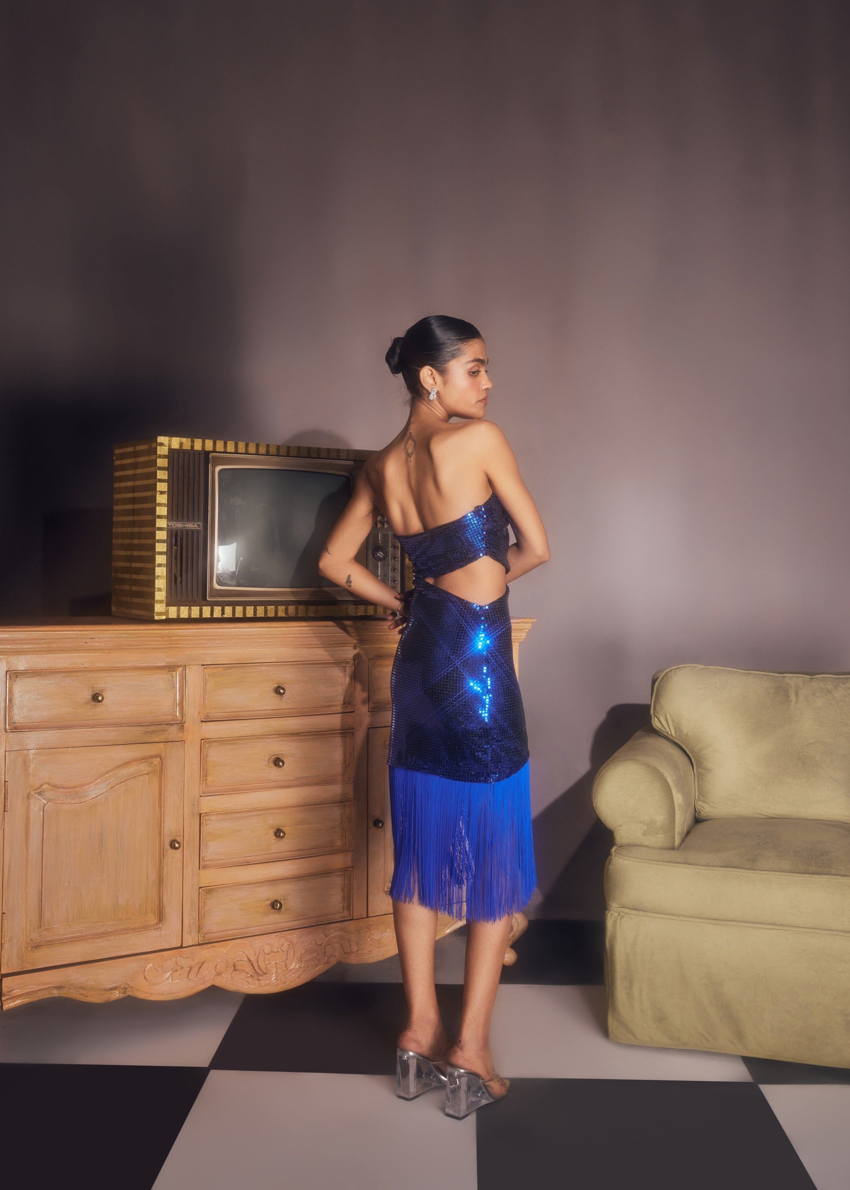 Siona blue shine tassel dress with a shimmering finish and playful tassel detailing