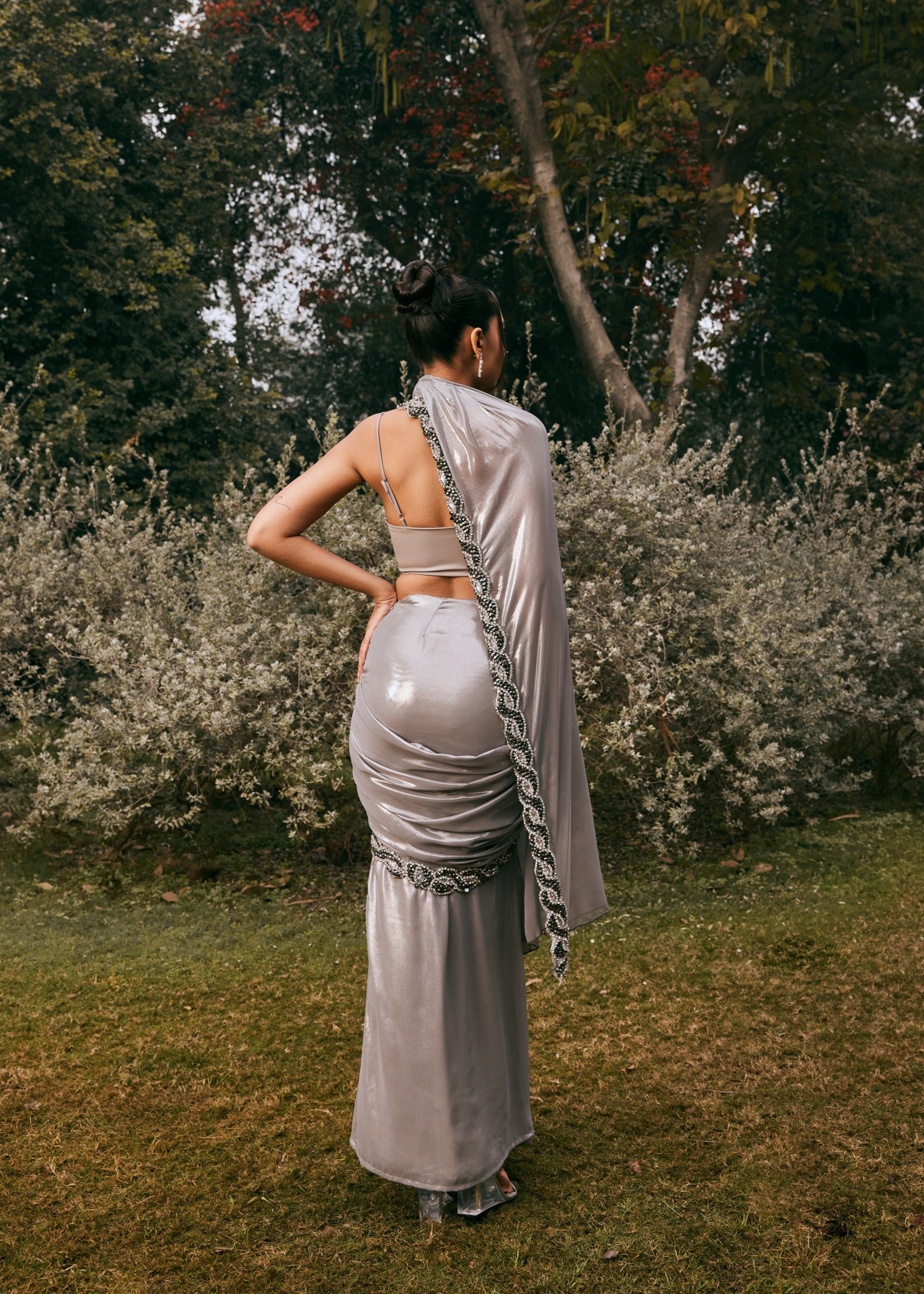 Sobia Grey Shimmer Chiffon Pre-Draped Saree Set featuring a shimmering grey chiffon fabric in a pre-draped design