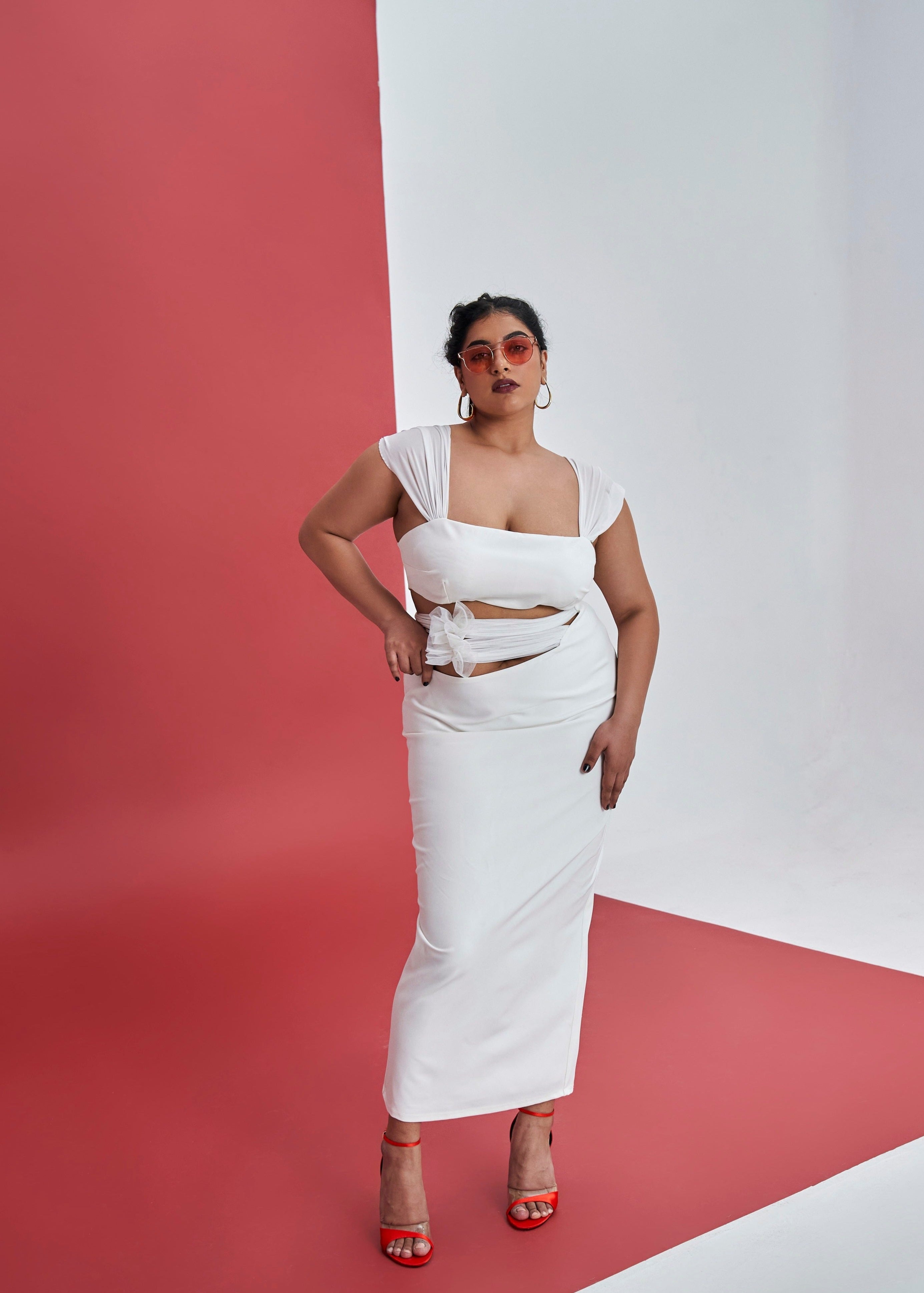 Sorelle White Cutout Coord Set with Bow Detailing featuring stylish cutouts and charming bow accents