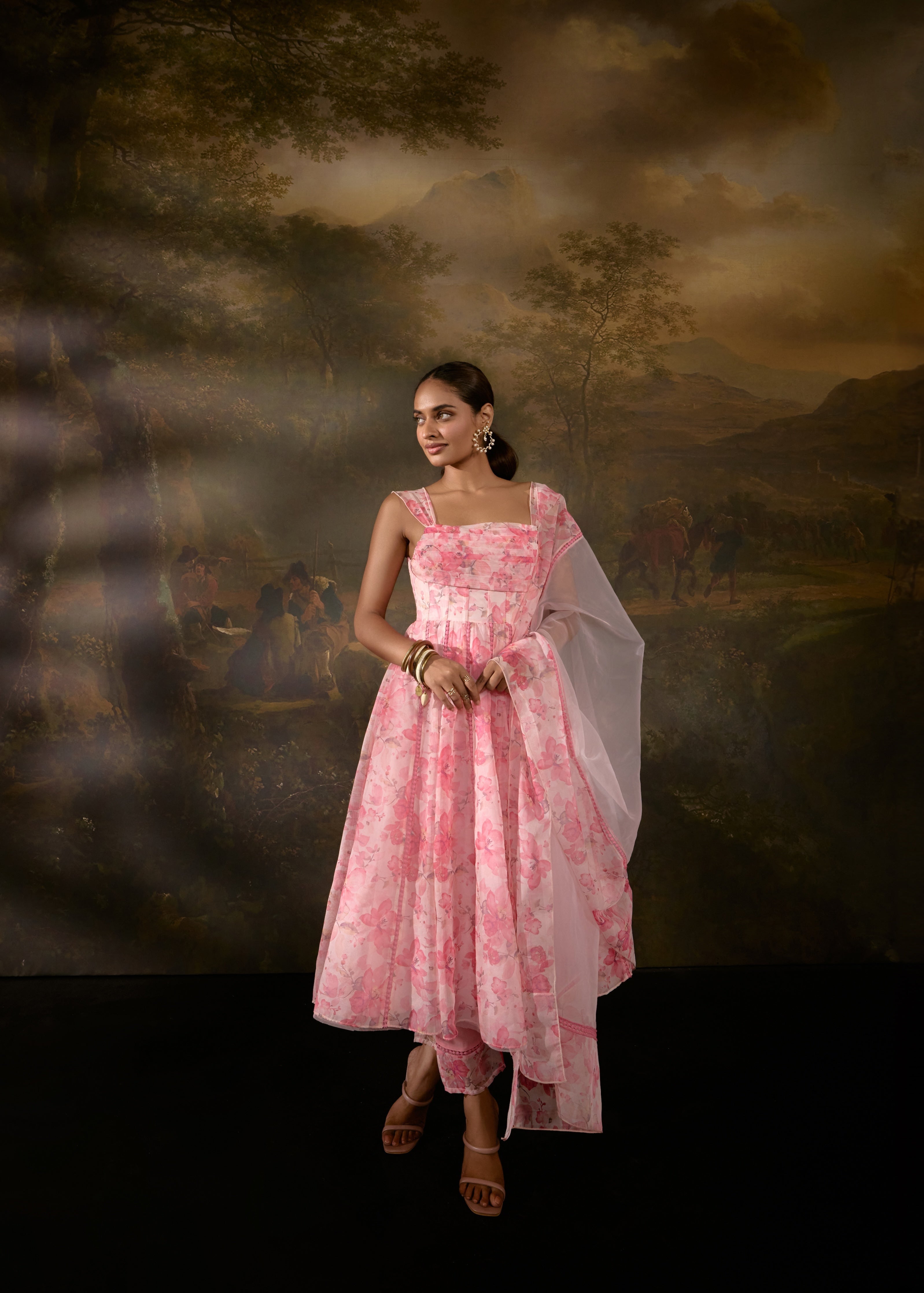 "Tanvee Pink Floral Printed Corset Anarkali Suit: Anarkali suit featuring a pink floral print corset for a graceful and