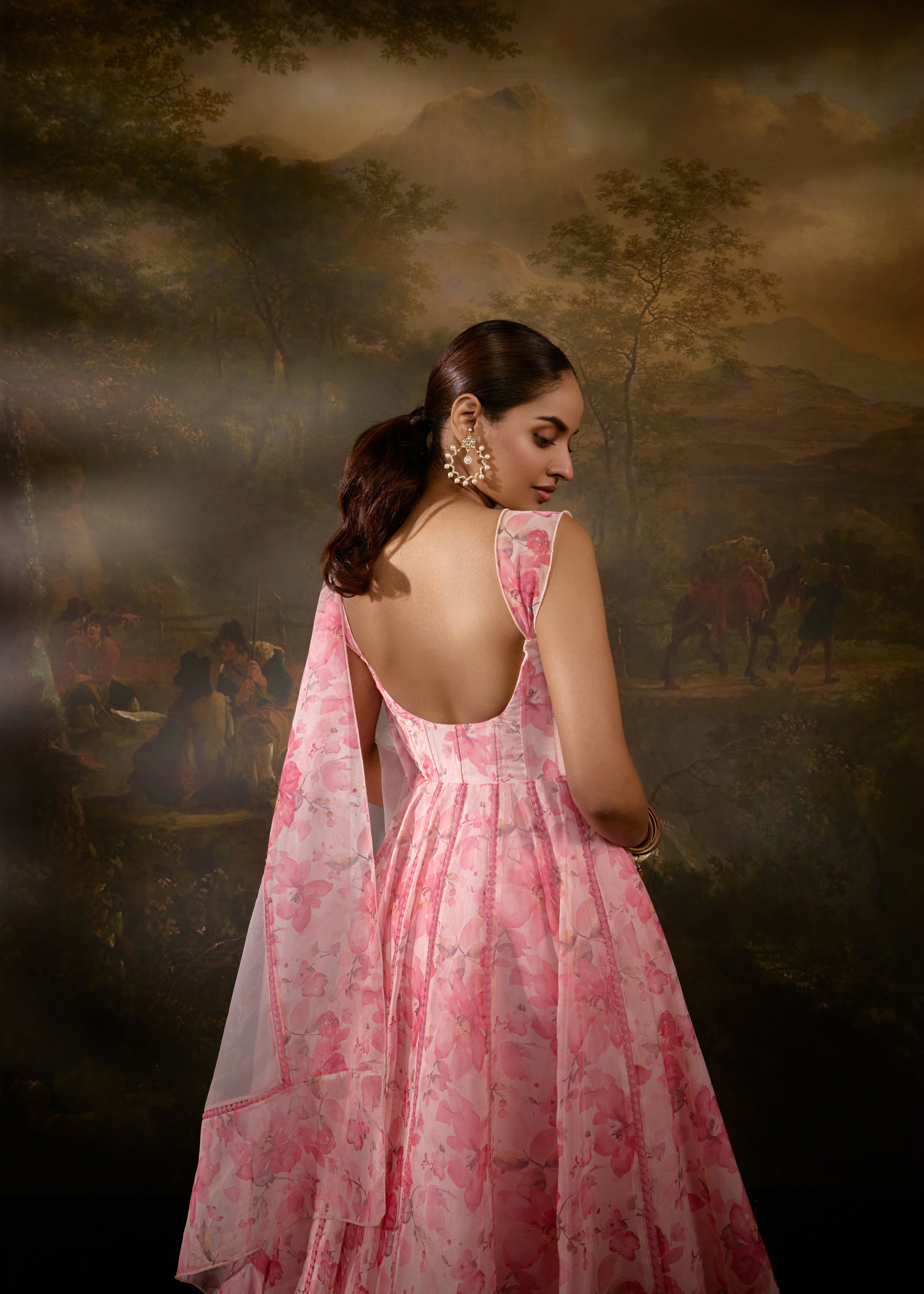 "Tanvee Pink Floral Printed Corset Anarkali Suit: Anarkali suit featuring a pink floral print corset for a graceful and