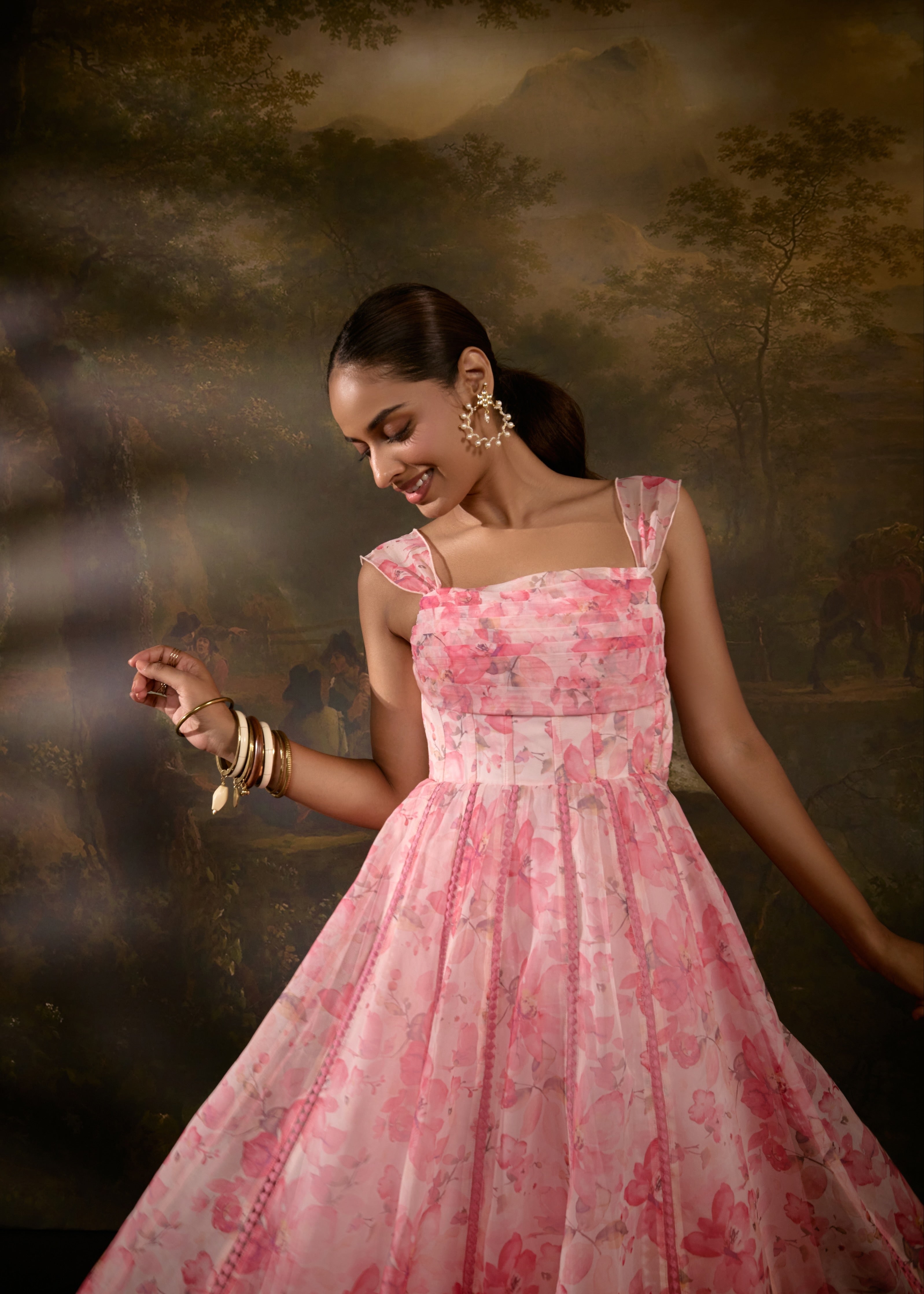 "Tanvee Pink Floral Printed Corset Anarkali Suit: Anarkali suit featuring a pink floral print corset for a graceful and