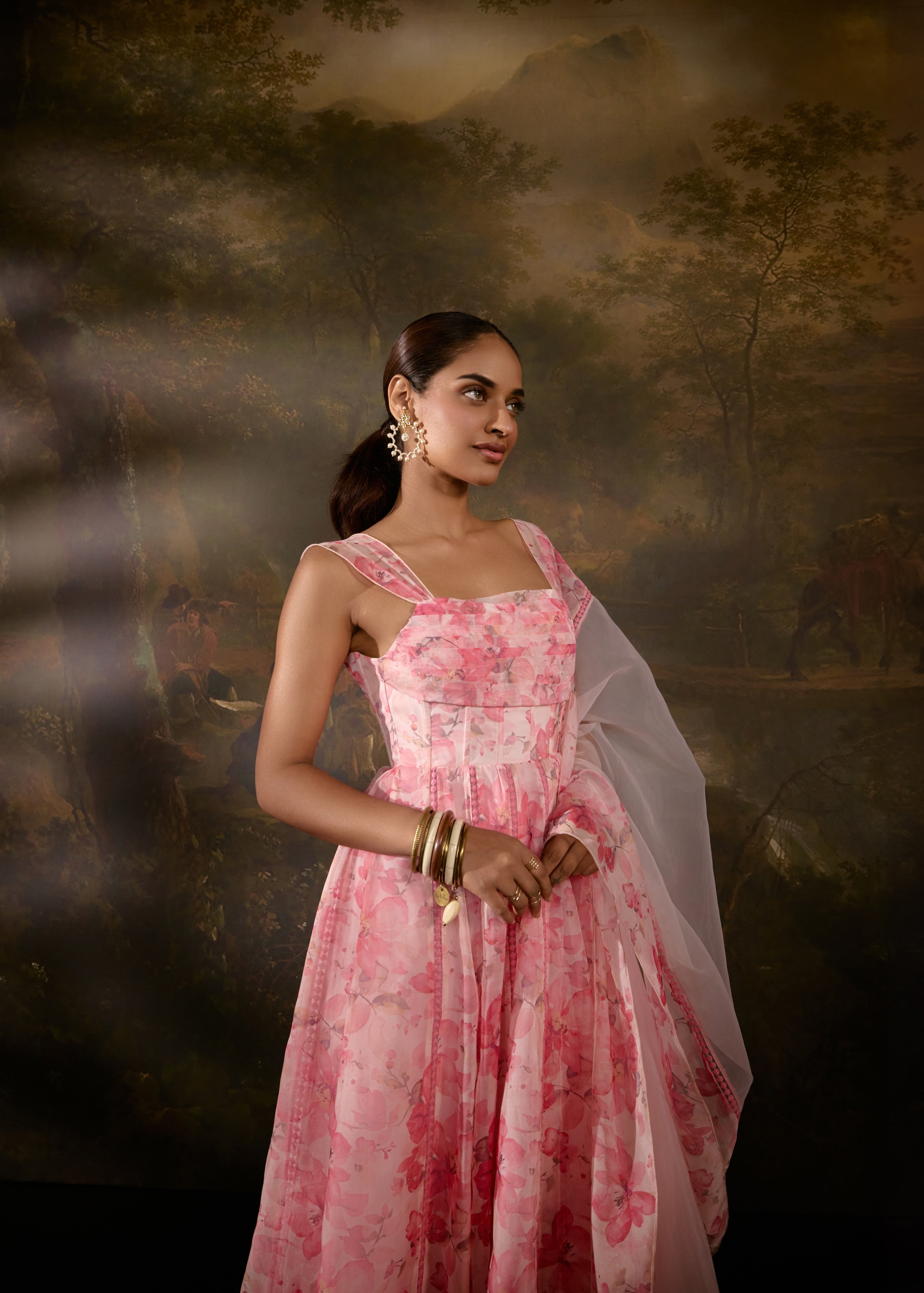 "Tanvee Pink Floral Printed Corset Anarkali Suit: Anarkali suit featuring a pink floral print corset for a graceful and