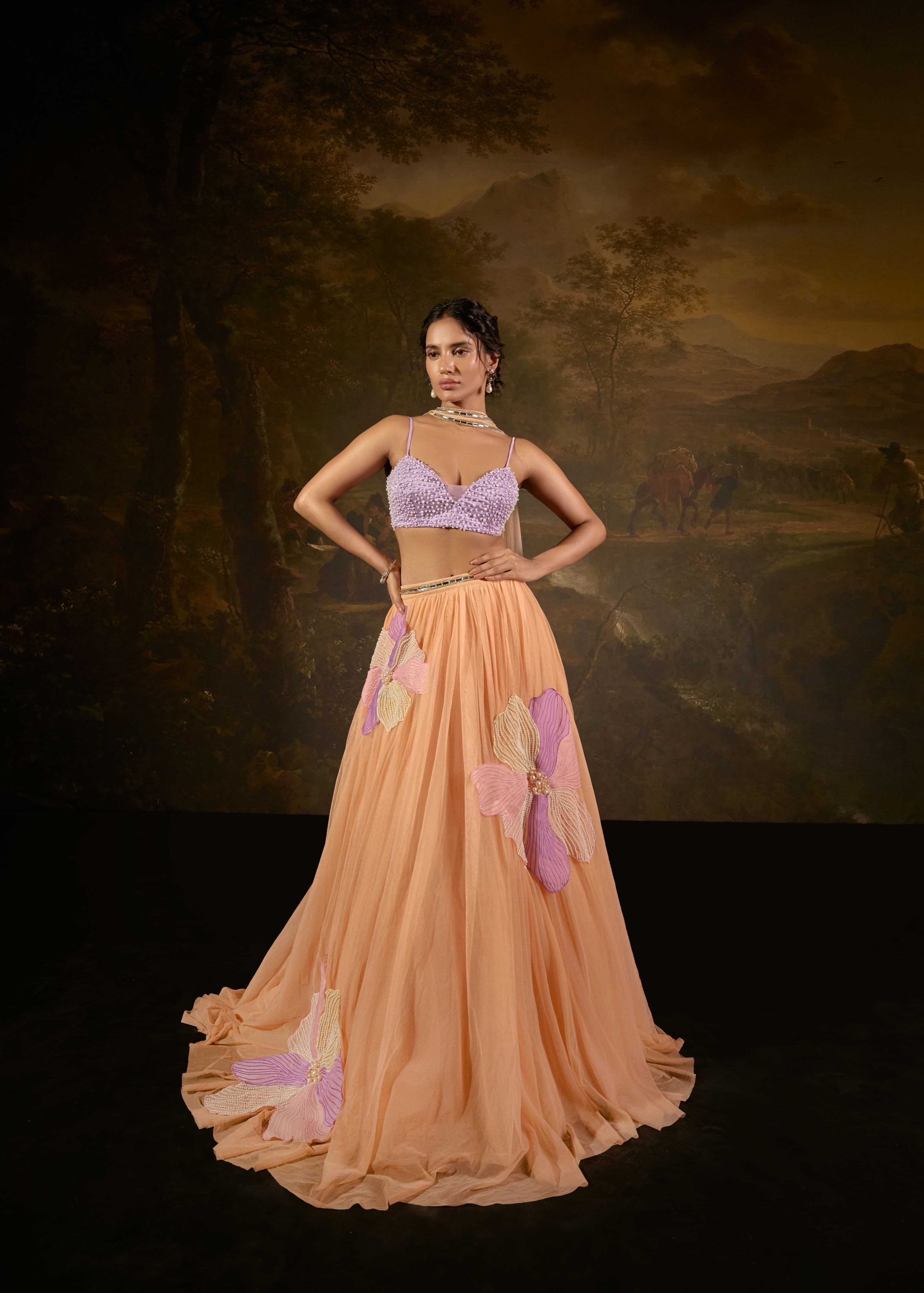"Tasmeekh Lavender And Orange Embroidered Lehenga Set: Vibrant lehenga set with intricate embroidery in lavender and orange, perfect for a festive look."