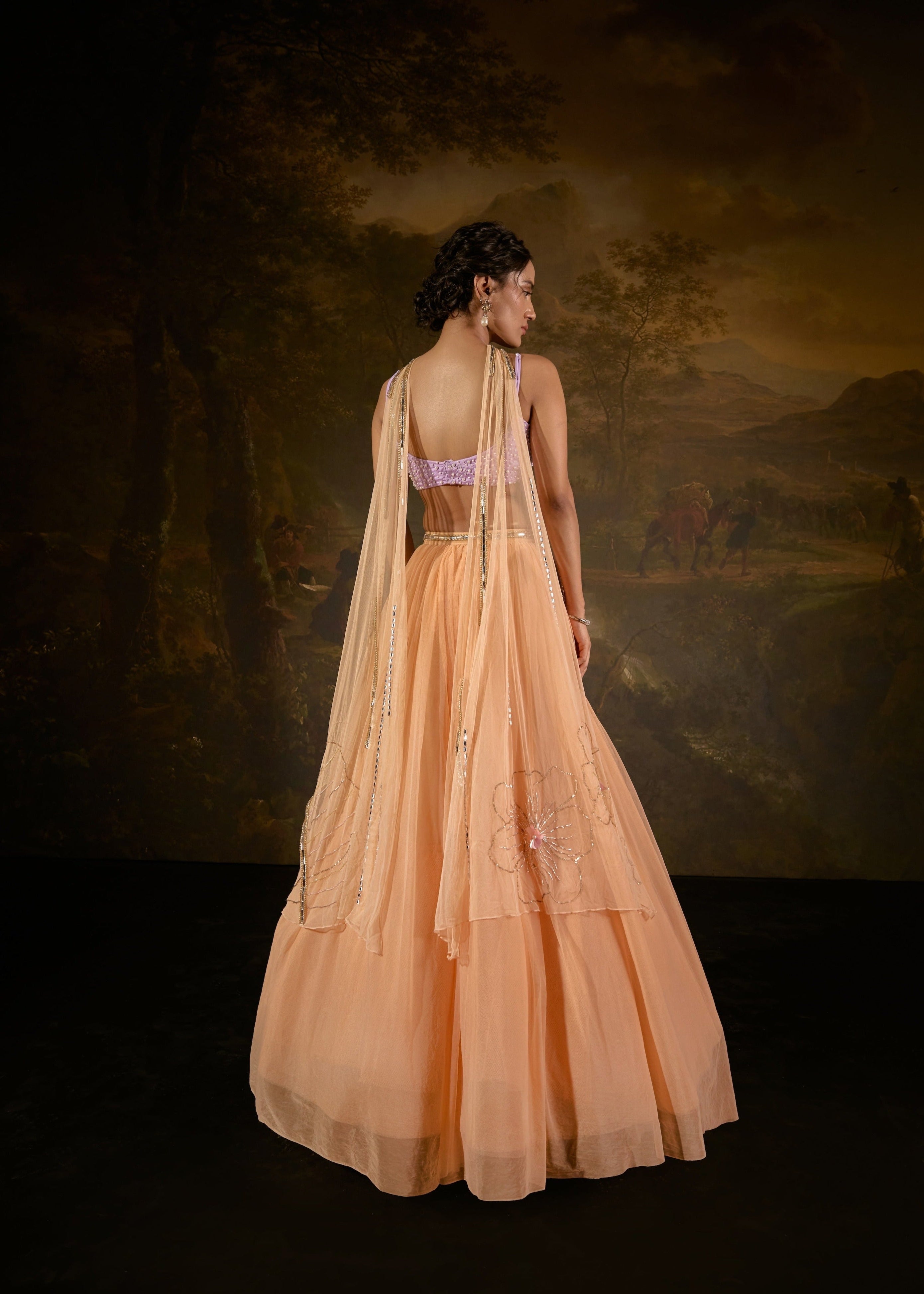 "Tasmeekh Lavender And Orange Embroidered Lehenga Set: Vibrant lehenga set with intricate embroidery in lavender and orange, perfect for a festive look."