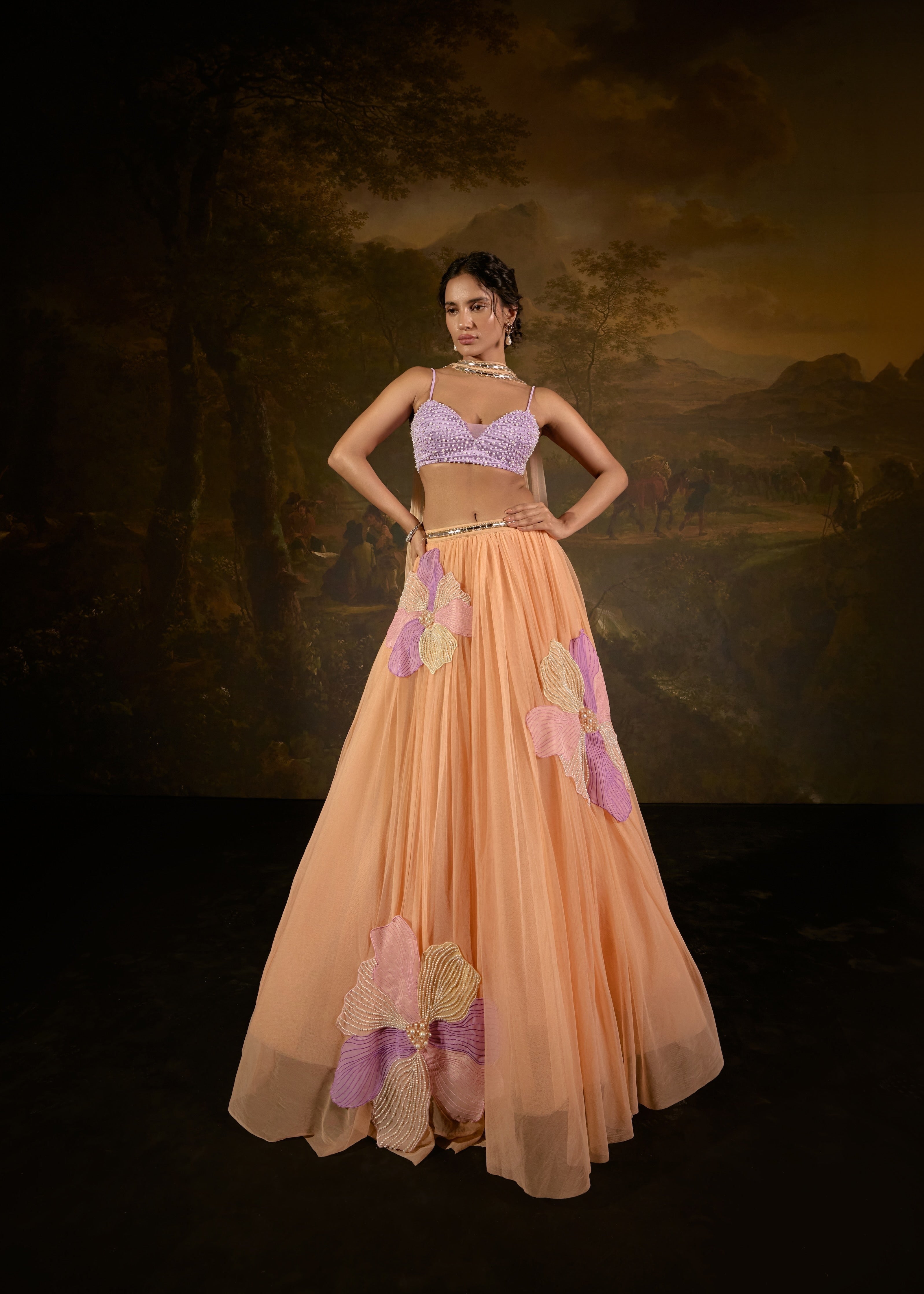 "Tasmeekh Lavender And Orange Embroidered Lehenga Set: Vibrant lehenga set with intricate embroidery in lavender and orange, perfect for a festive look."