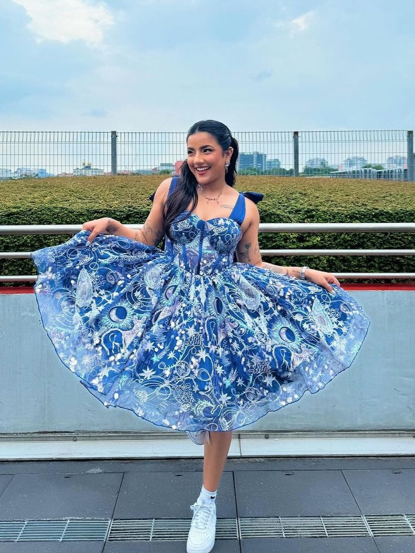 Taylor Blue Embroidered Midi Corset Dress featuring elegant blue embroidery and a fitted corset bodice.