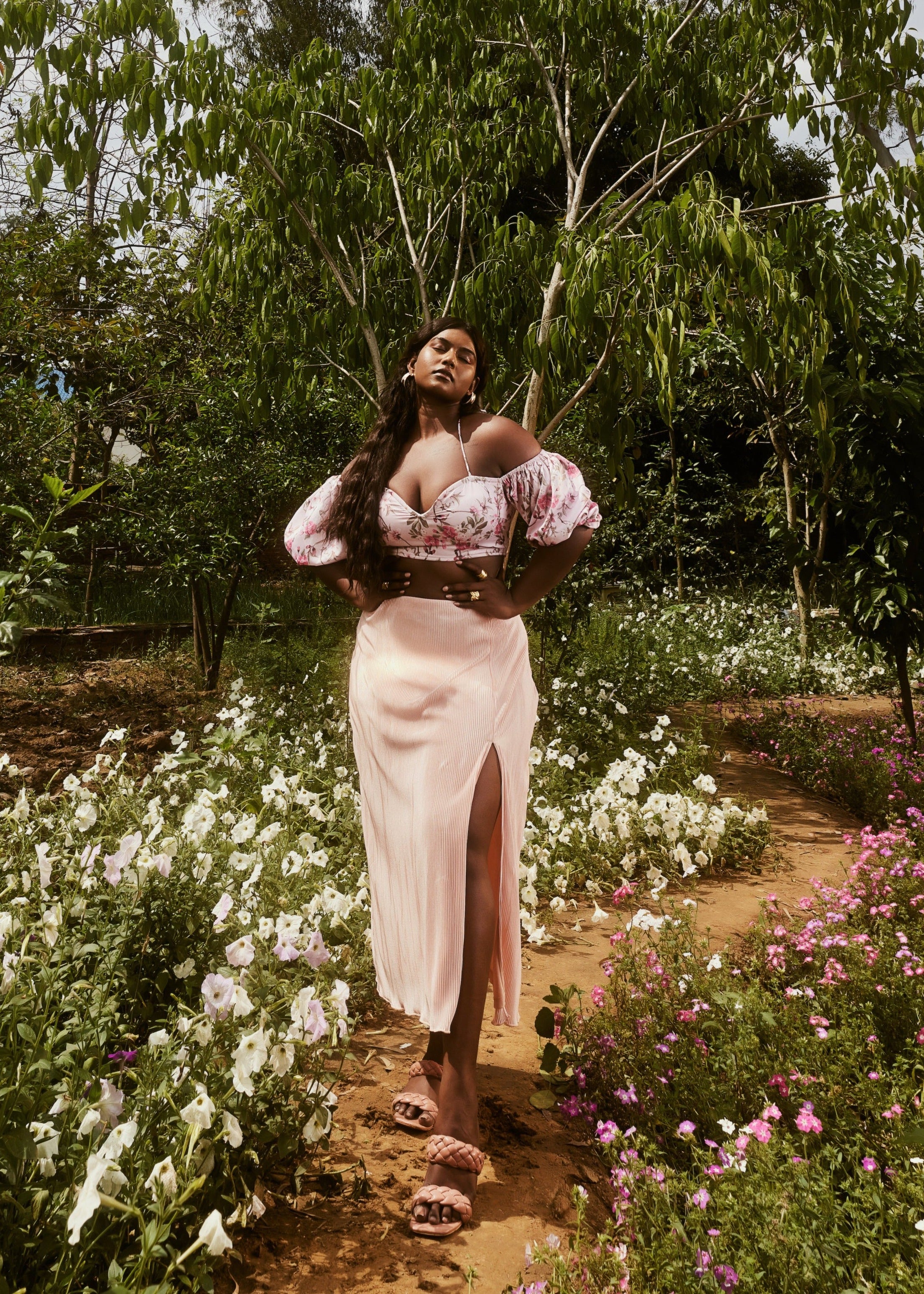 Venetia Peach Floral Top & Pleated Skirt Set with a floral-patterned top and a pleated skirt in a soft peach shade